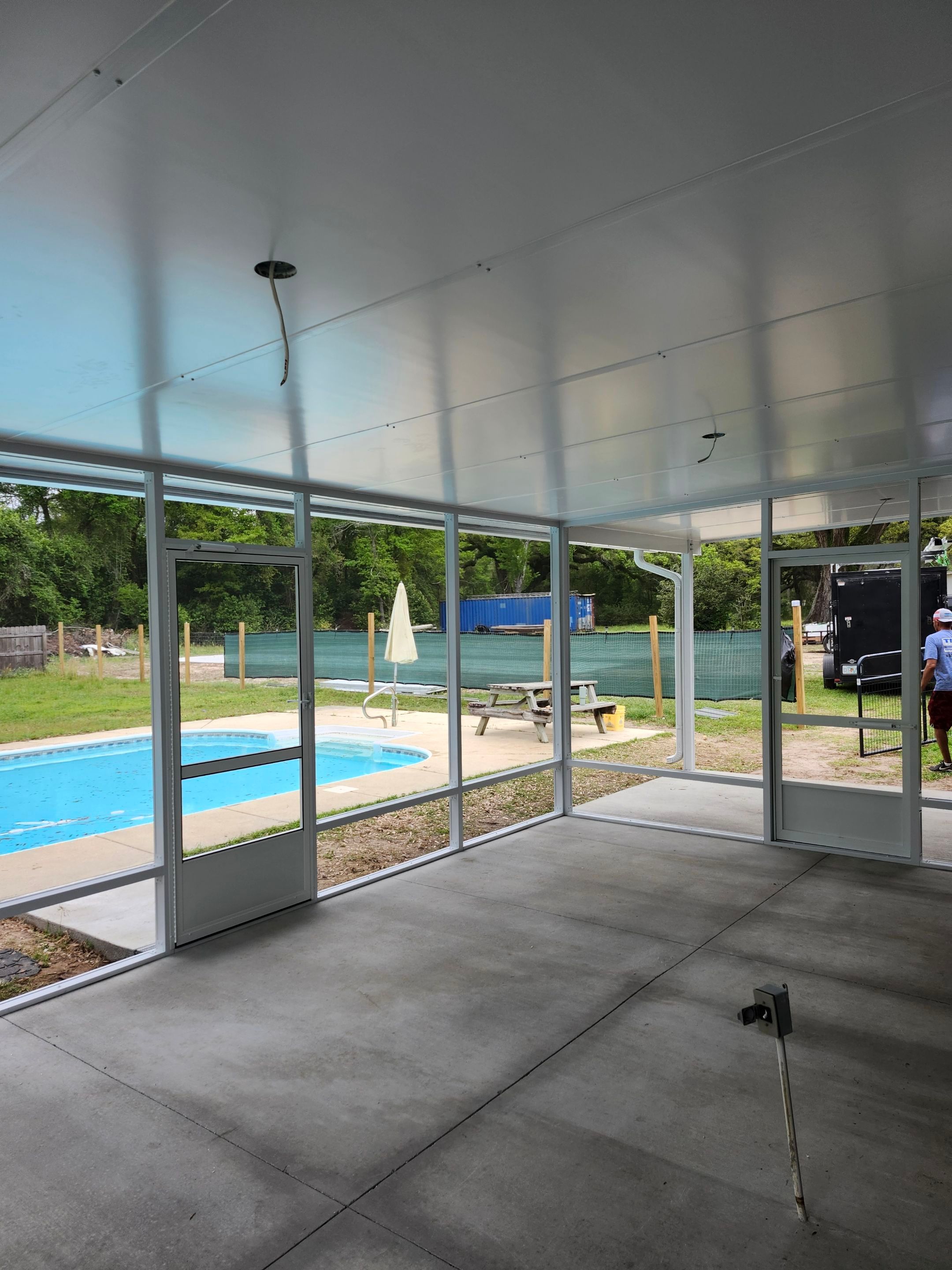 Poolside Screen Room in Pace by Titan Sunrooms