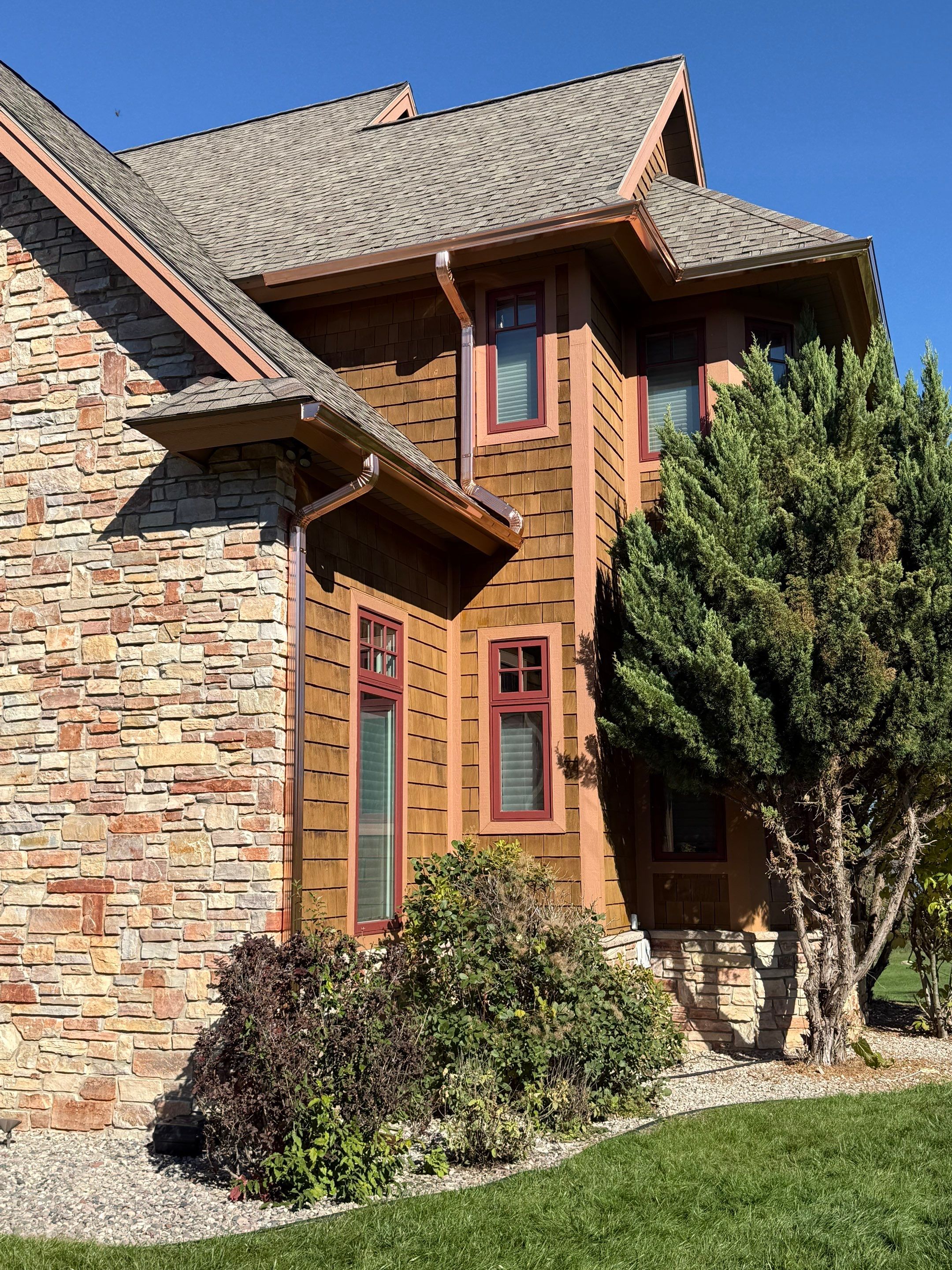 Custom Copper Gutter and Metal Downspout Installation in Williamsburg by Rainbow Seamless Systems