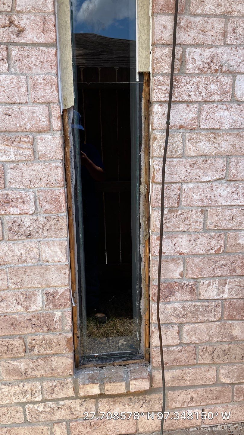 Colored Vinyl Windows to blend into brick by Bayfront Roofing and Construction