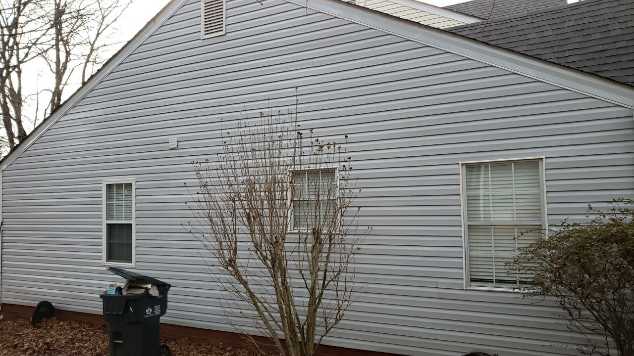 Gutter Cleaning using water by Power Wash Masters LLC