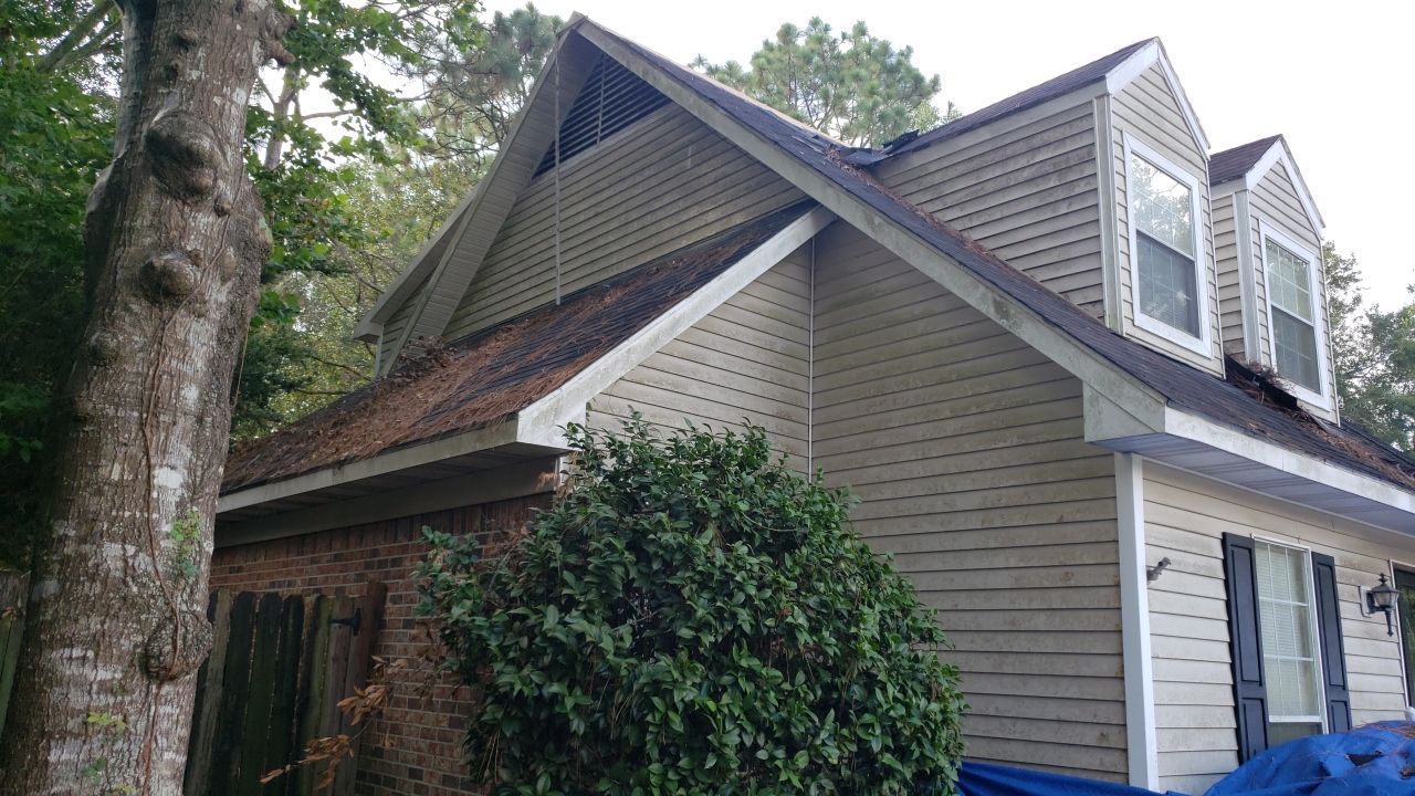 Residential Roofing Installation using Roof Replacement by American Roofing & Construction LLC