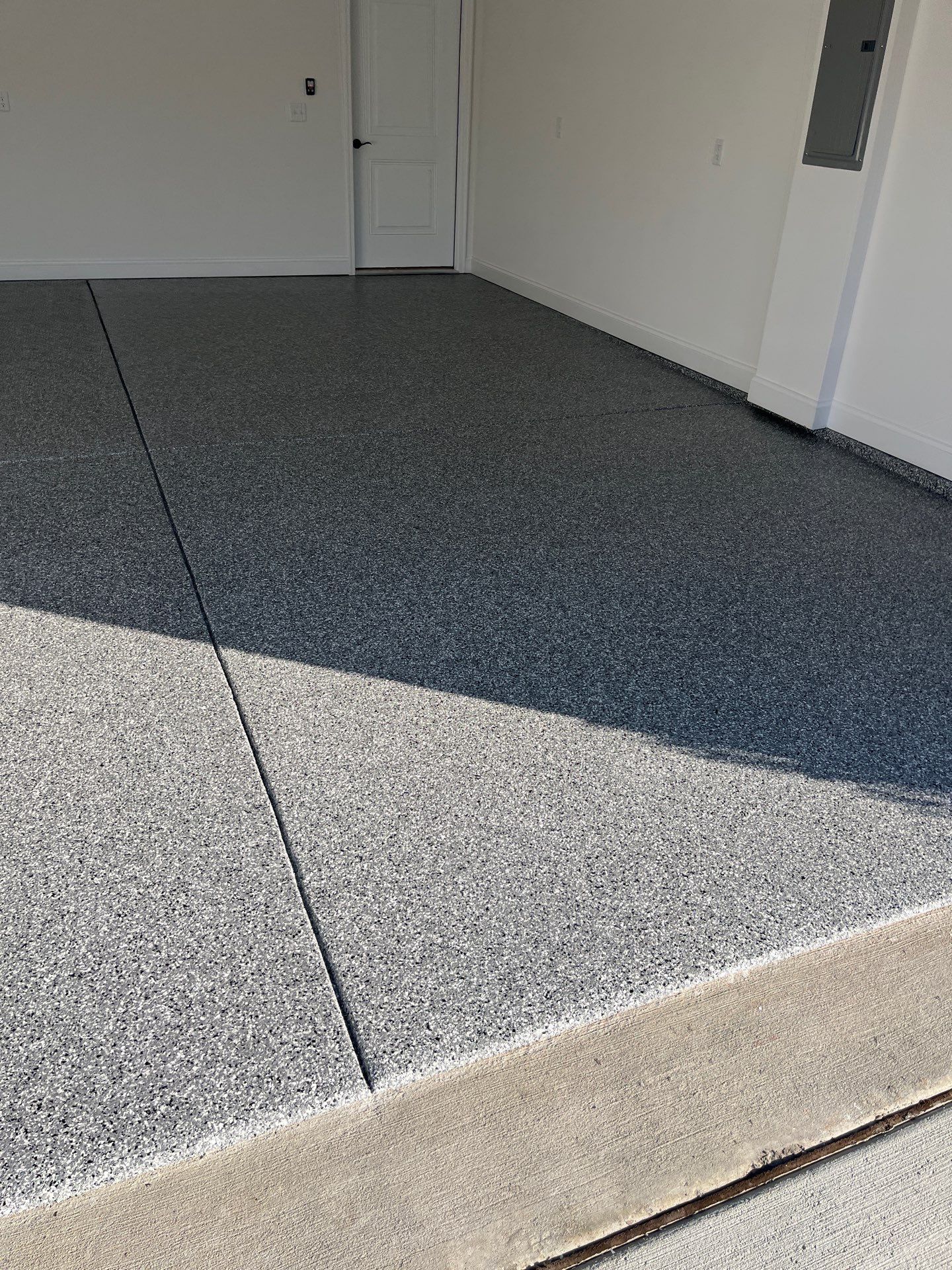 Garage Floor Coating using Wombat by My Garage Floor Guys