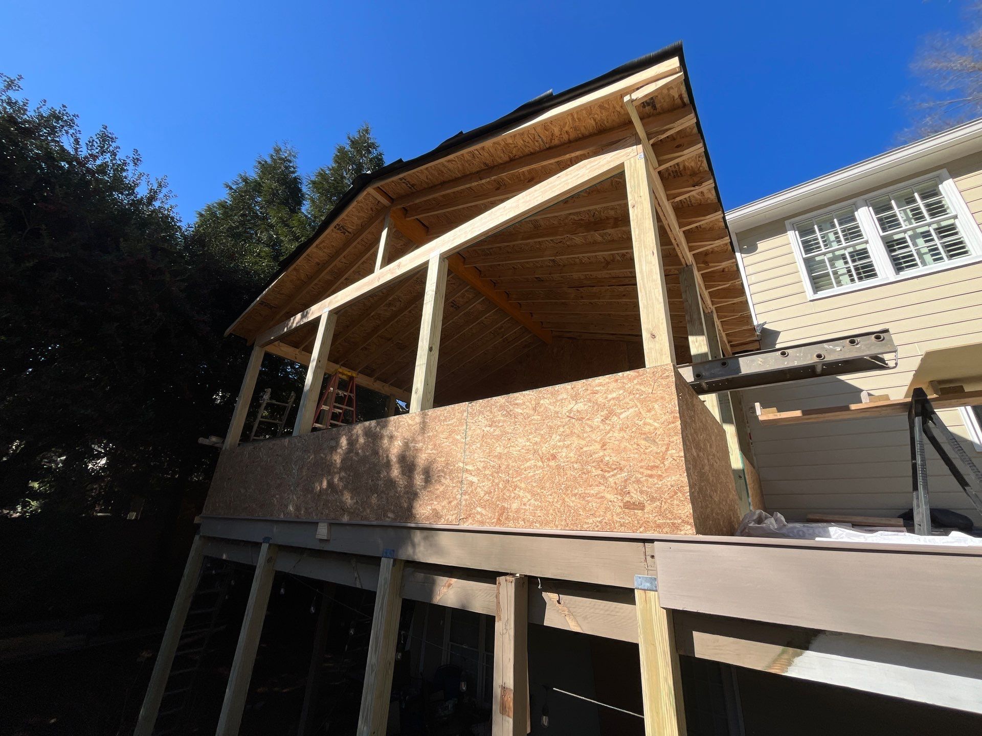 Deck Resurface and Screened-In Porch Build with Timbertech LED Lantern Post Cap Lights by Nelson Exteriors