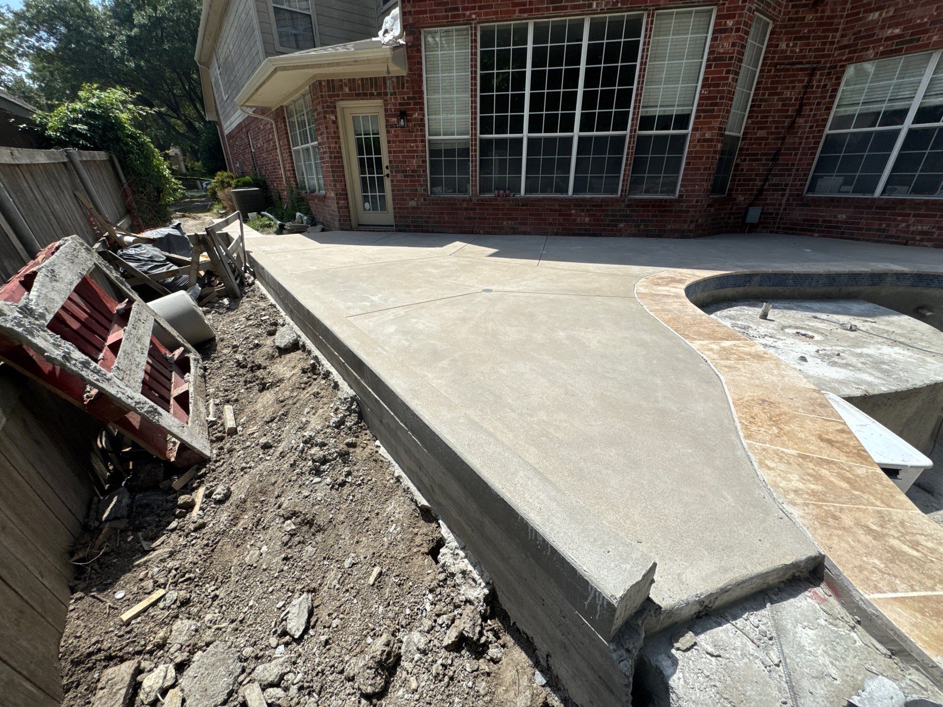 Freeform Pool with Rock Waterfall and Raised Spa by Pinnacle Pools and Spas - DFW