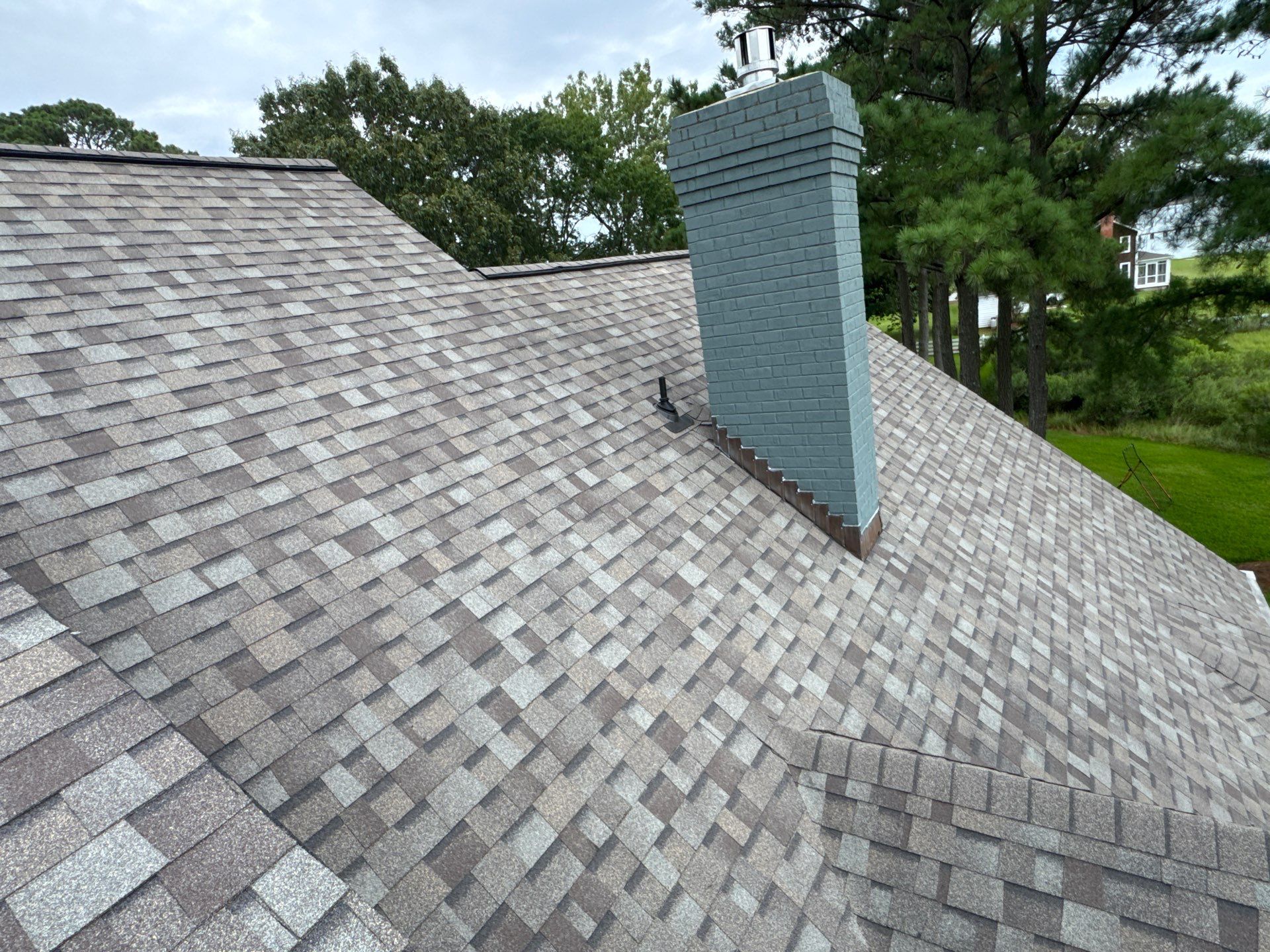 Roof Replacement and White Gutter Installation in Gloucester by Cade Construction
