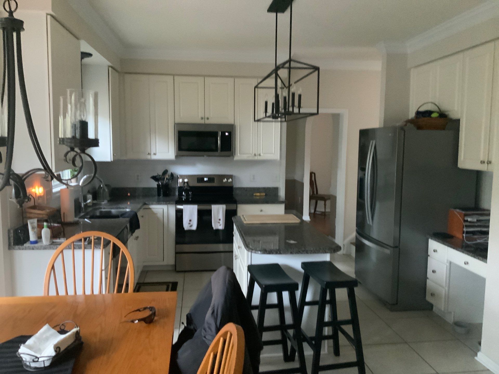 Cabinet painting by GonzalezPainters & Contractors Inc 