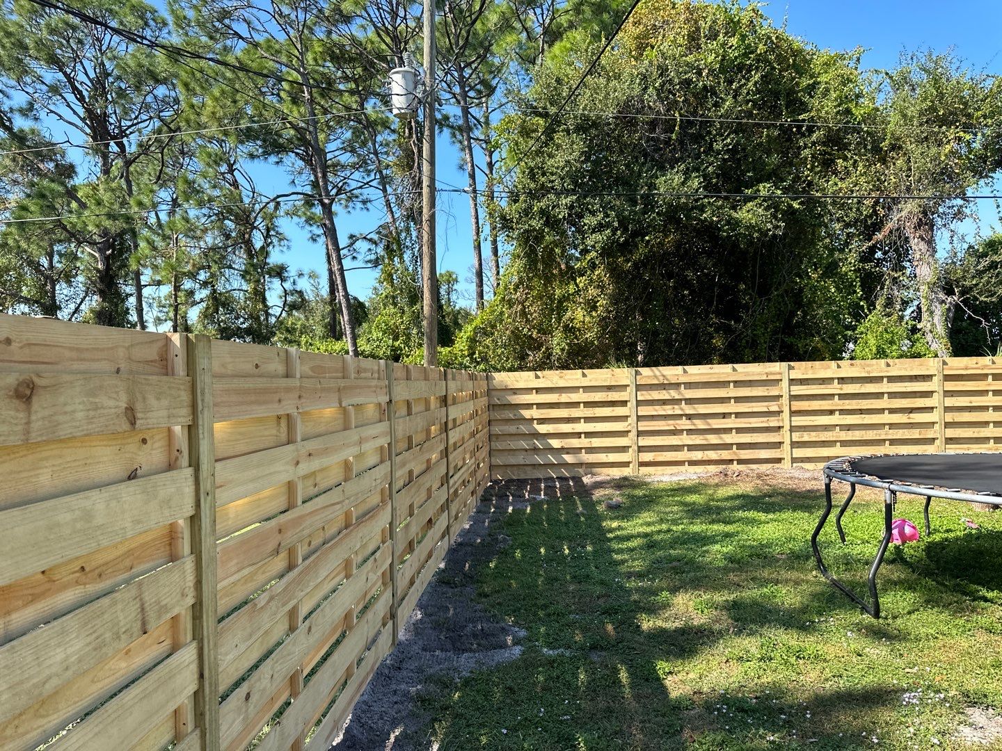 Wood Fence Installation using 6 Ft. Tall Pressure Treated Wood Shadowbox Fence by Asap fence and gates, LLC