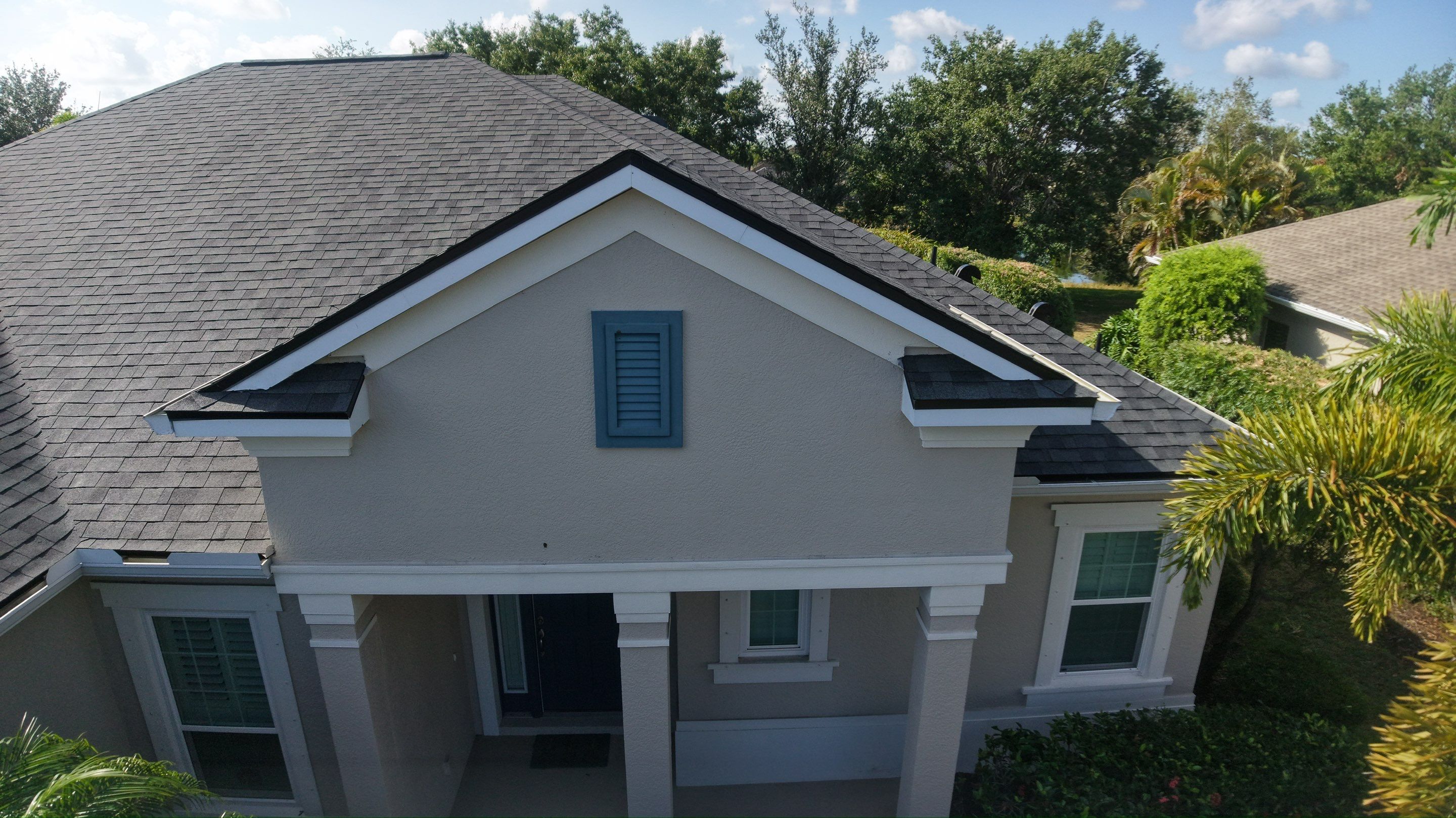 Residential Roof Installation With Estate Grey Architectural Shingles in Bradenton by Trinity Restoration and Roofing LLC