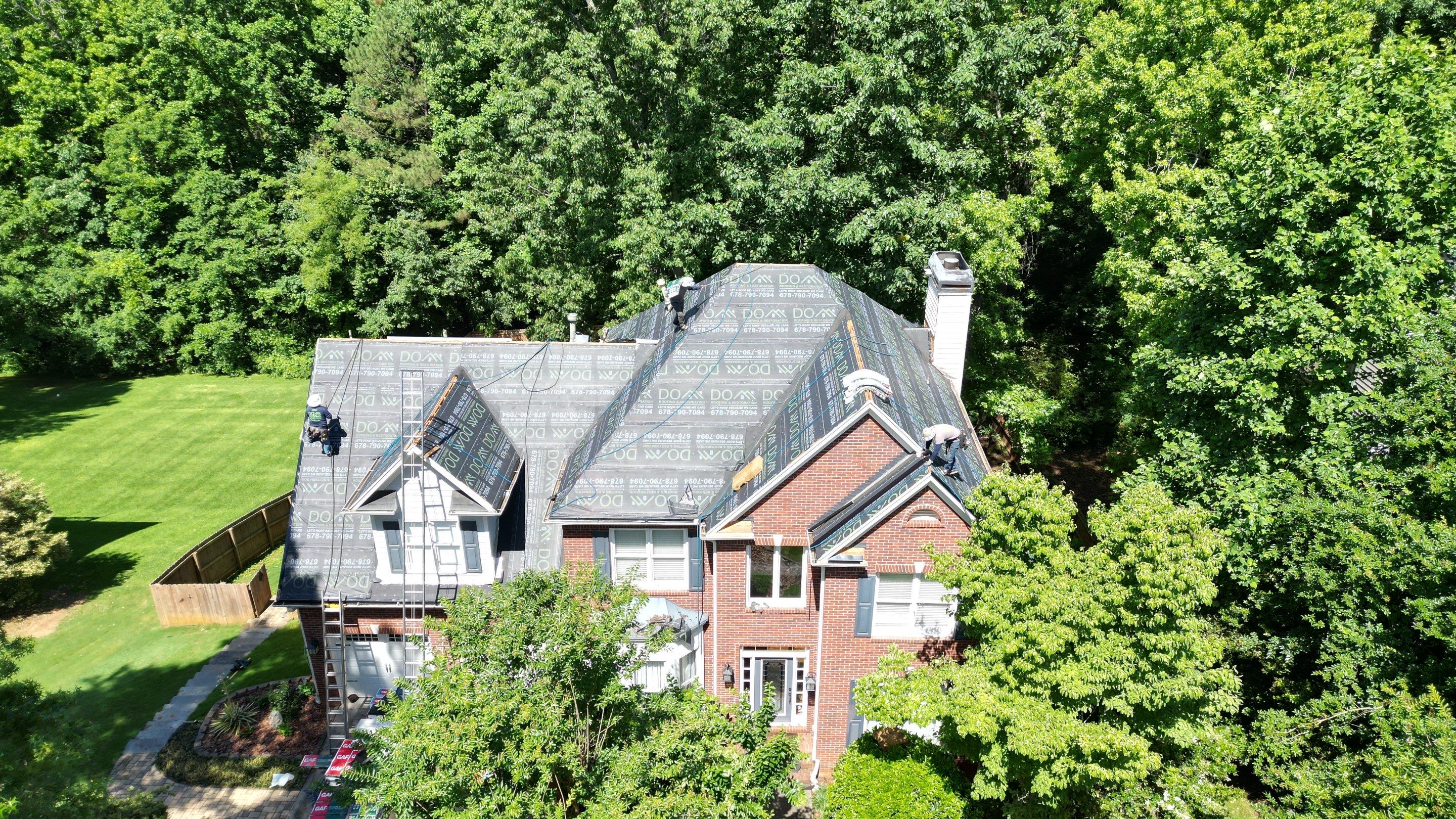 Barrett Downs Dr Cumming Roof Replacement  by Dom Roofing & Restoration