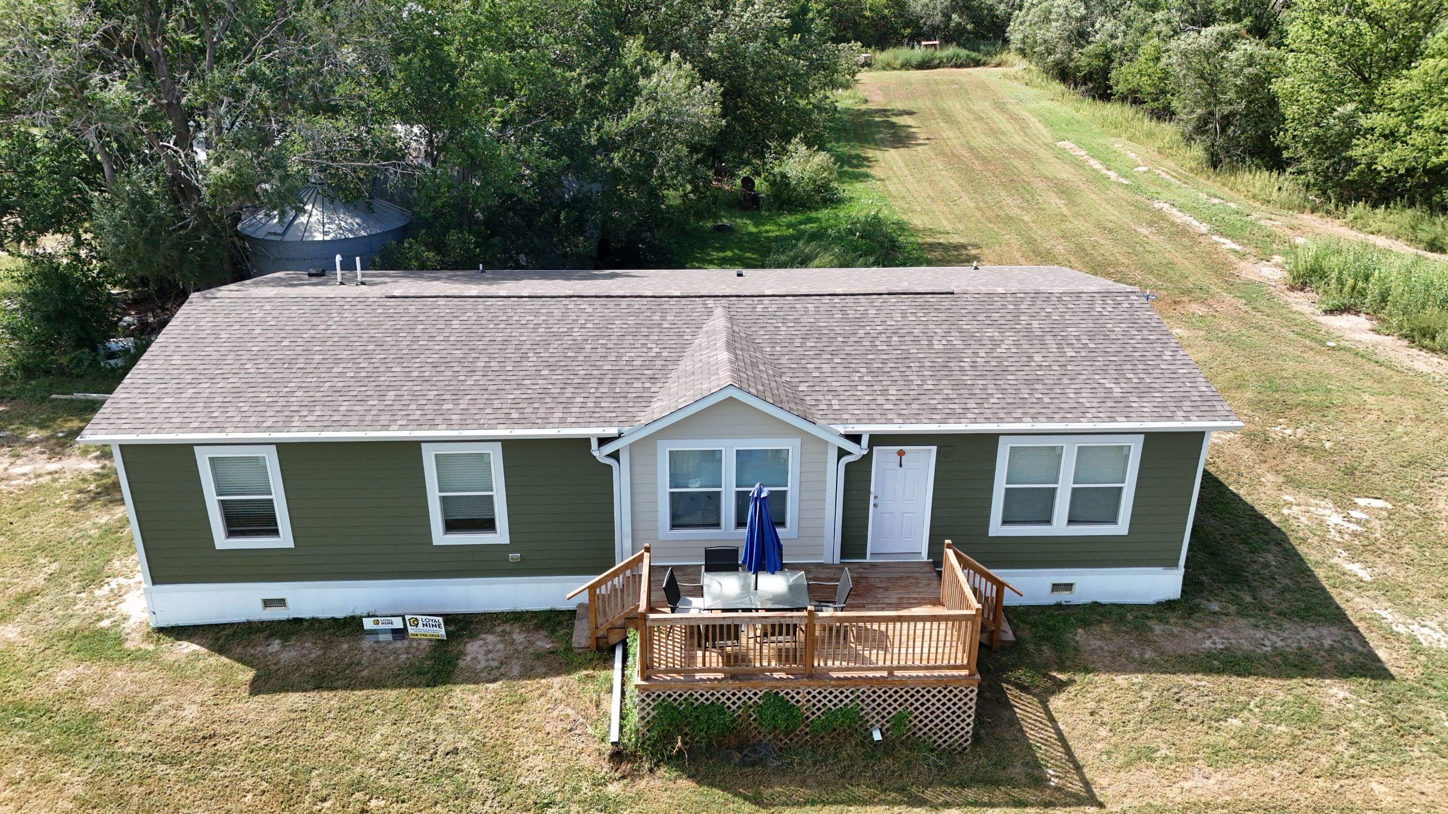 Riverdale Exterior Transformation | TAMKO Roofing & James Hardie Siding by Loyal Nine