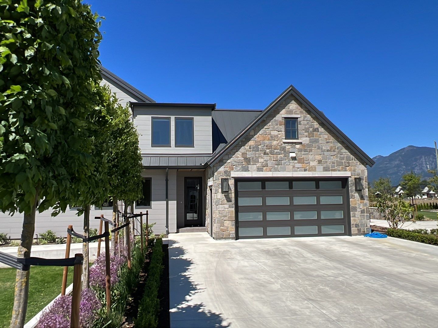 Residential Roofing Installation using 12" Prolok metal  by Top Notch Roofing Inc