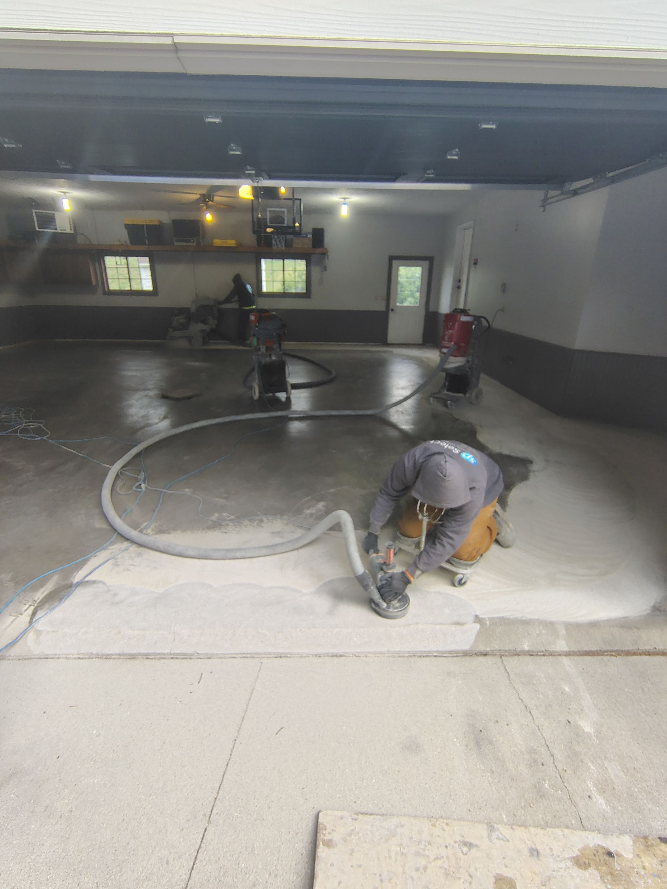 Multi-Fleck Epoxy Garage Floor Coating in Dell Rapids by Select Painting, Coatings & Garage Cabinets