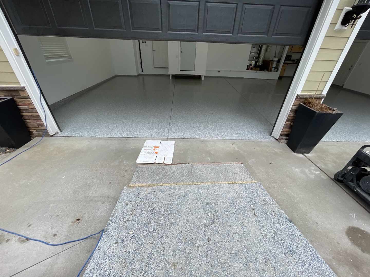 Garage Transformation using Slate Stone by Croc Coatings, LLC