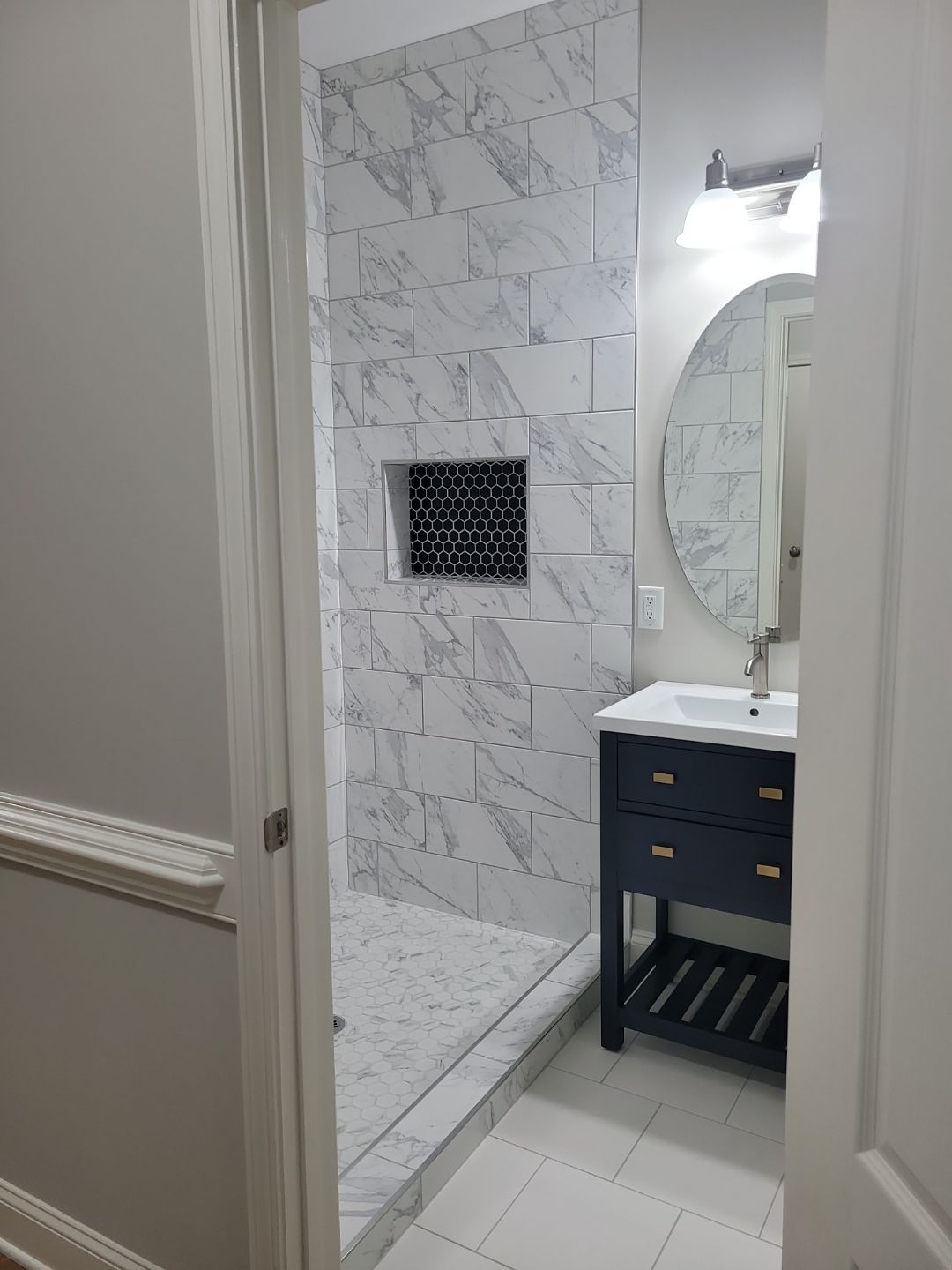 A Pathway to Possibility – Turning a Half Bath into a Full Retreat in Holly Springs by Elite Remodeling and Design LLC