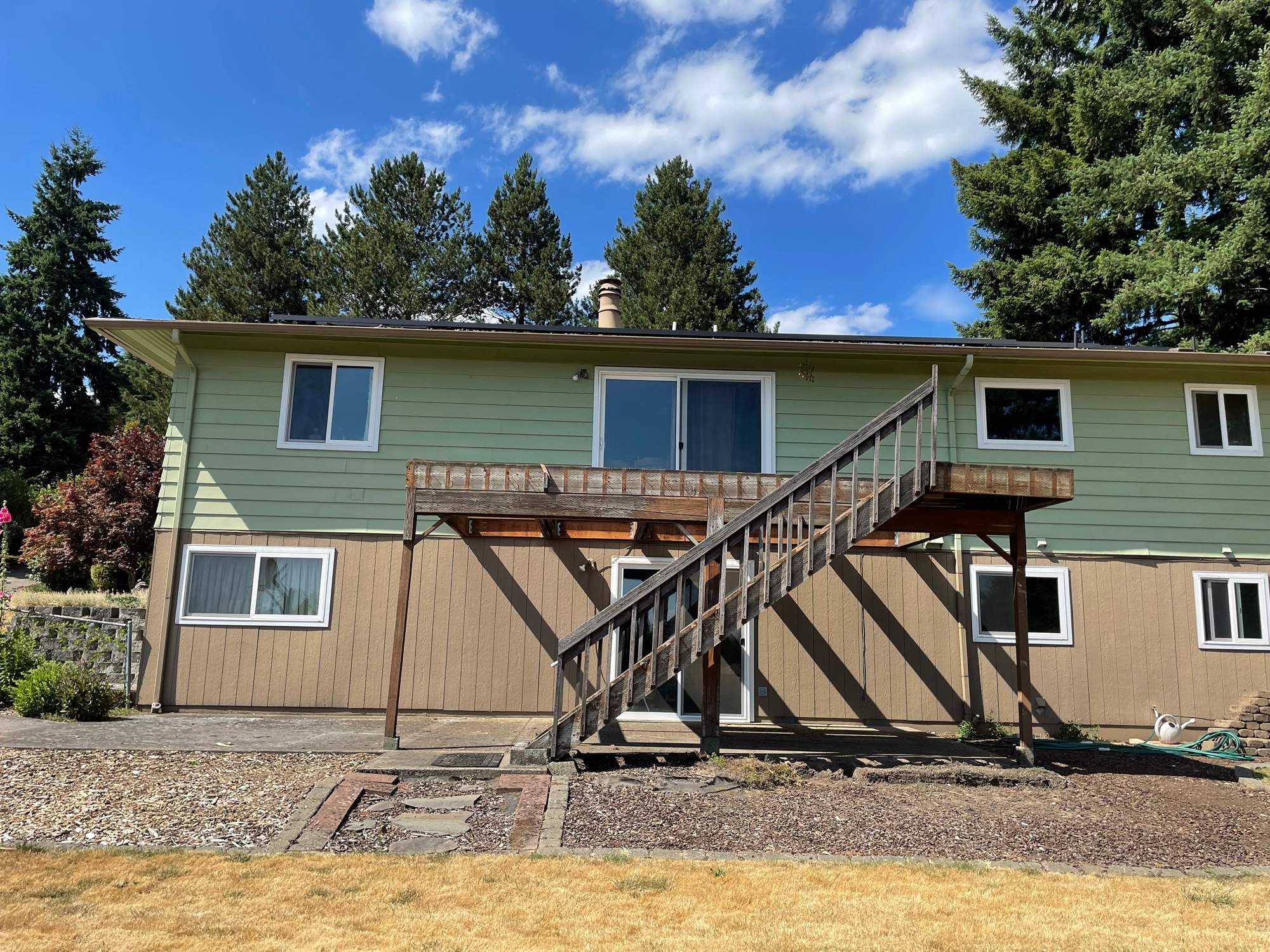 Tigard Exterior Renovation Featuring Composite Deck and Custom Catio by American Made Construction