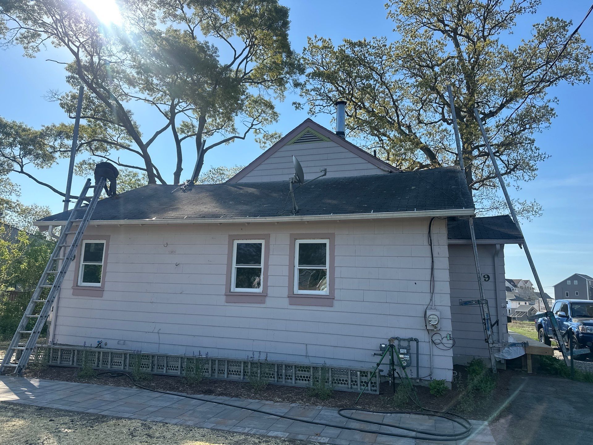 Milford Exterior Renovation Featuring Custom Siding and Wood Deck Installation by A Plus Exterior