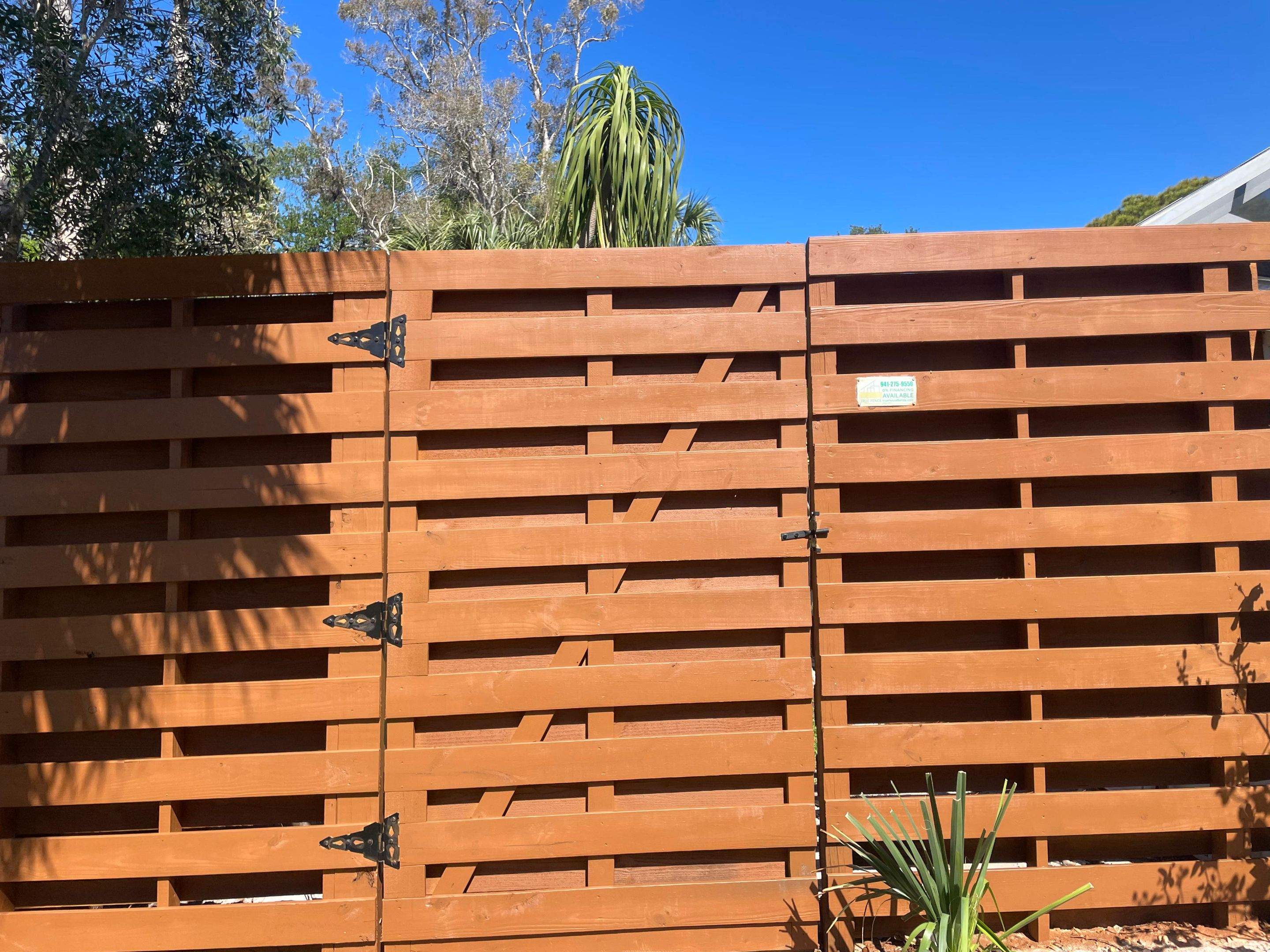 8'H Stained Shadowbox Wood in Nokomis by True Fence LLC