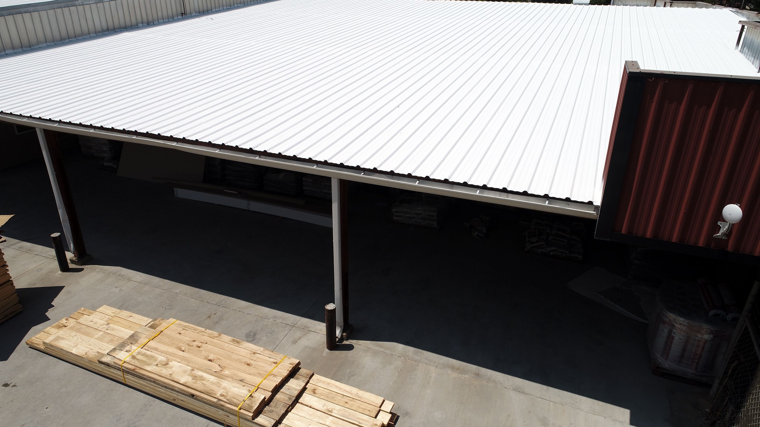 Commercial Roofing Installation using Aldocoat Coatings by Hostetler Roofing