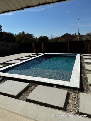 Classic Geometric Pool with Expansive Concrete Deck