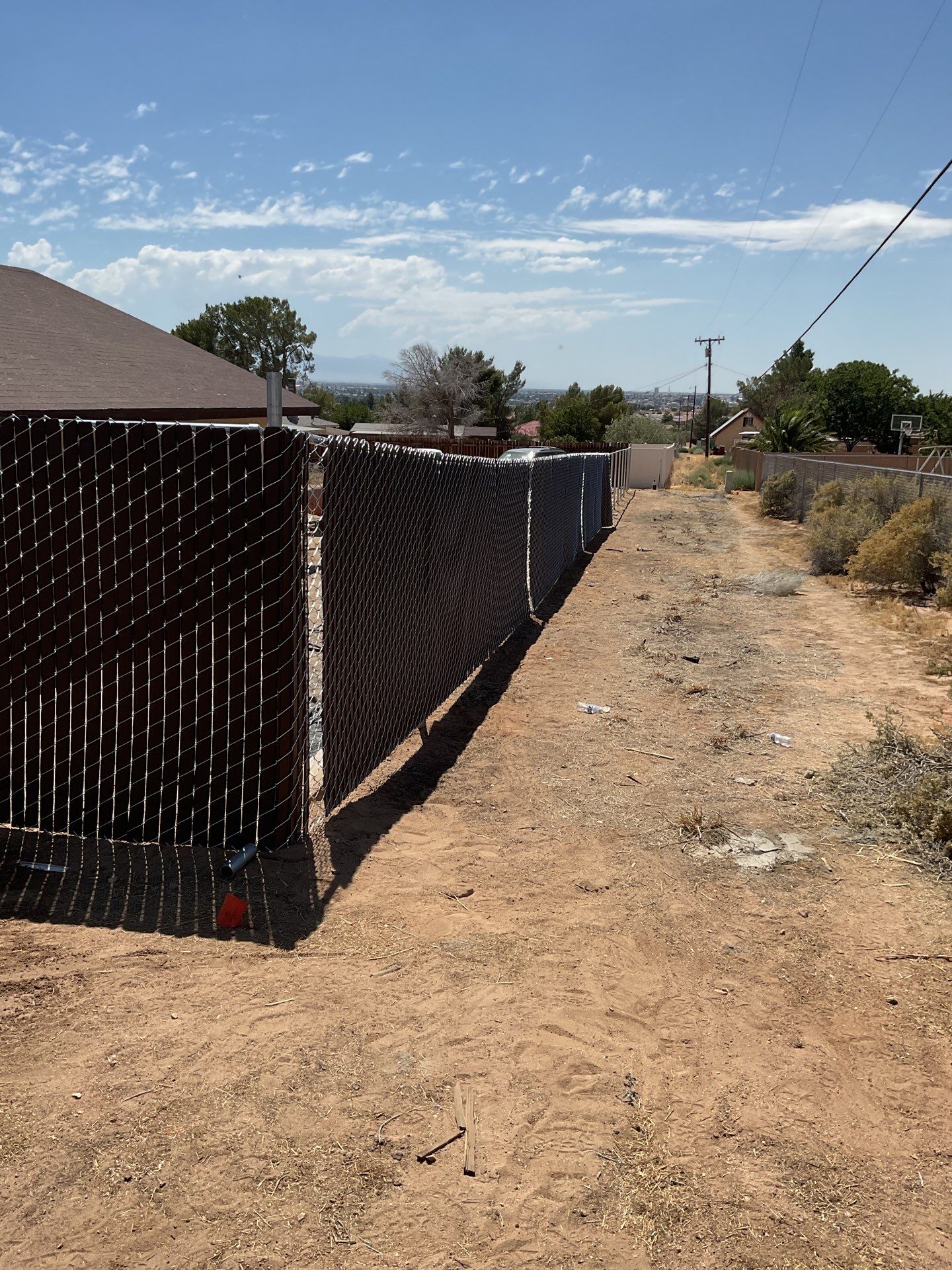 Dark Brown Privacy Chain Link Fence by Fence Guys Inc.