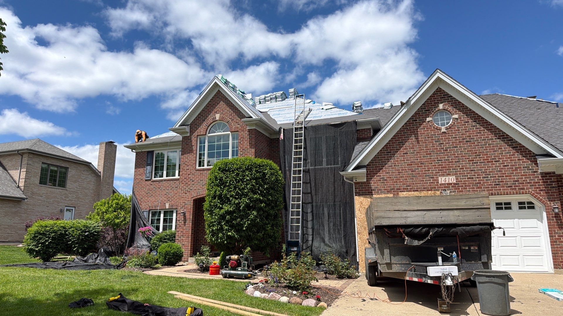 Asphalt Shingle Roof Replacement and Skylight Installation in Darien by Pro Home Services Inc