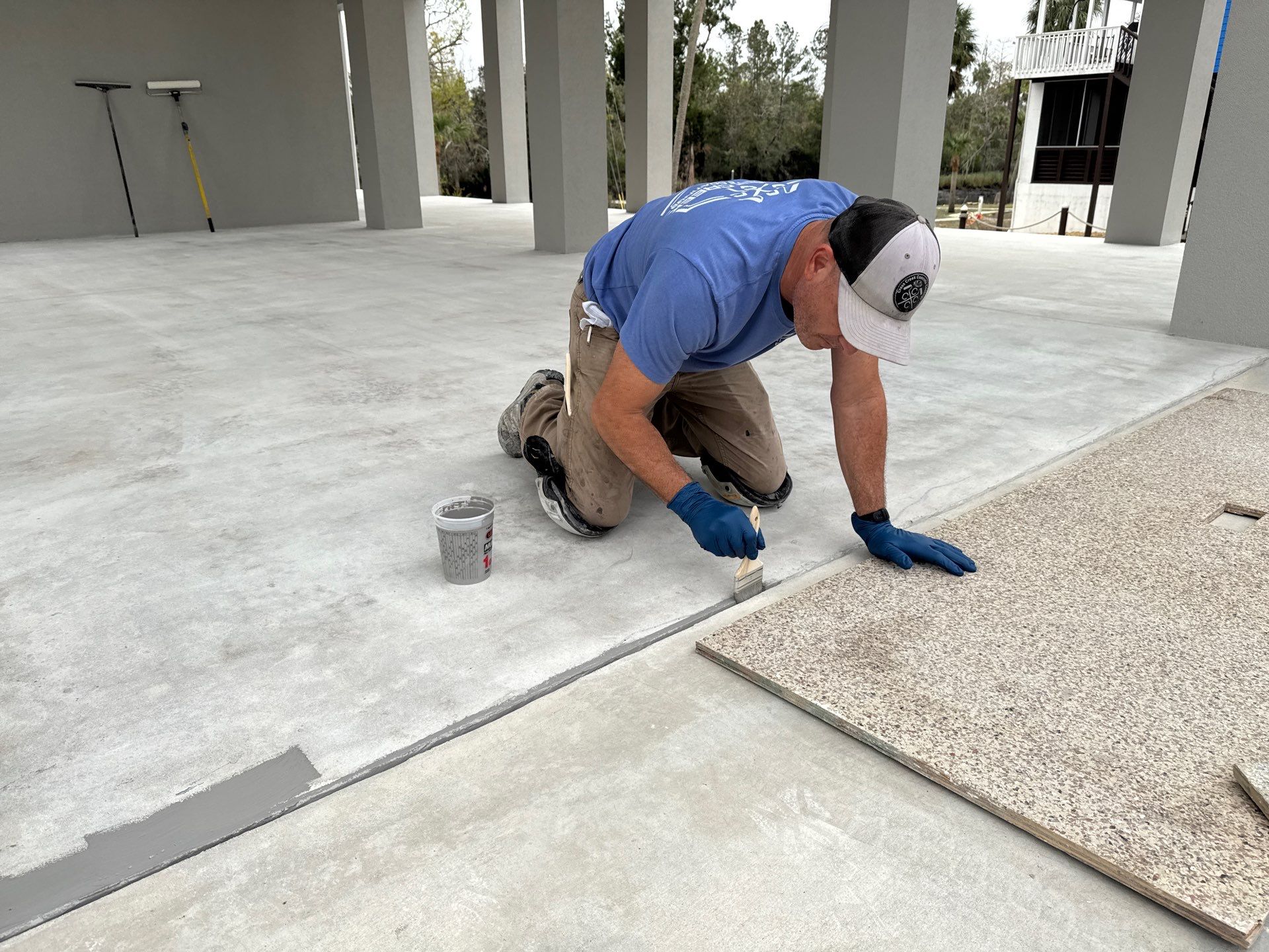 Under Side of Home in Hybrid Shale by Cross Creek Concrete Coatings