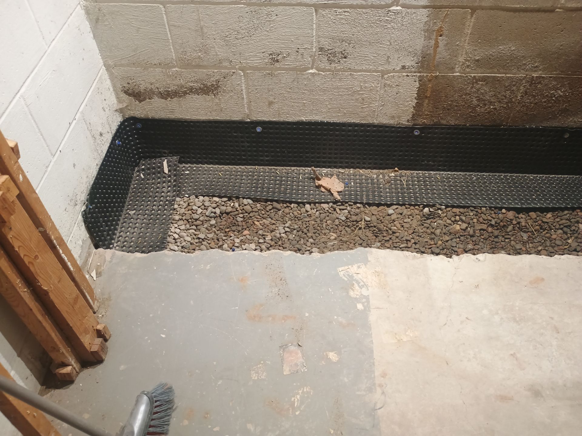 Interior Drain Tile Installation near Columbia Heights, MN by Waterproofing Northeast