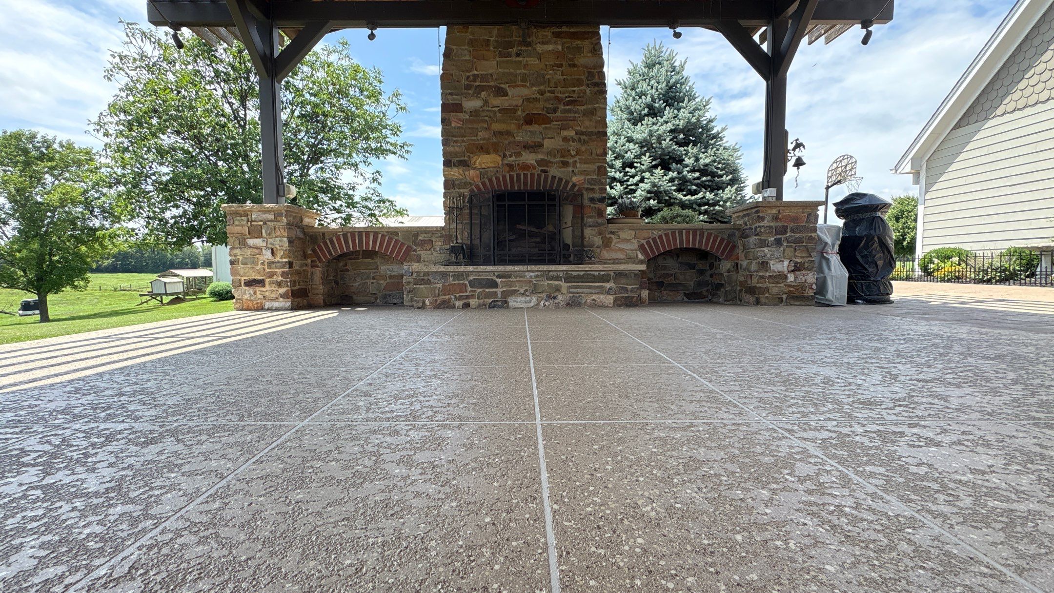 Custom Back Patio Resurface - Kearney, MO by Big Red Decorative Concrete, LLC
