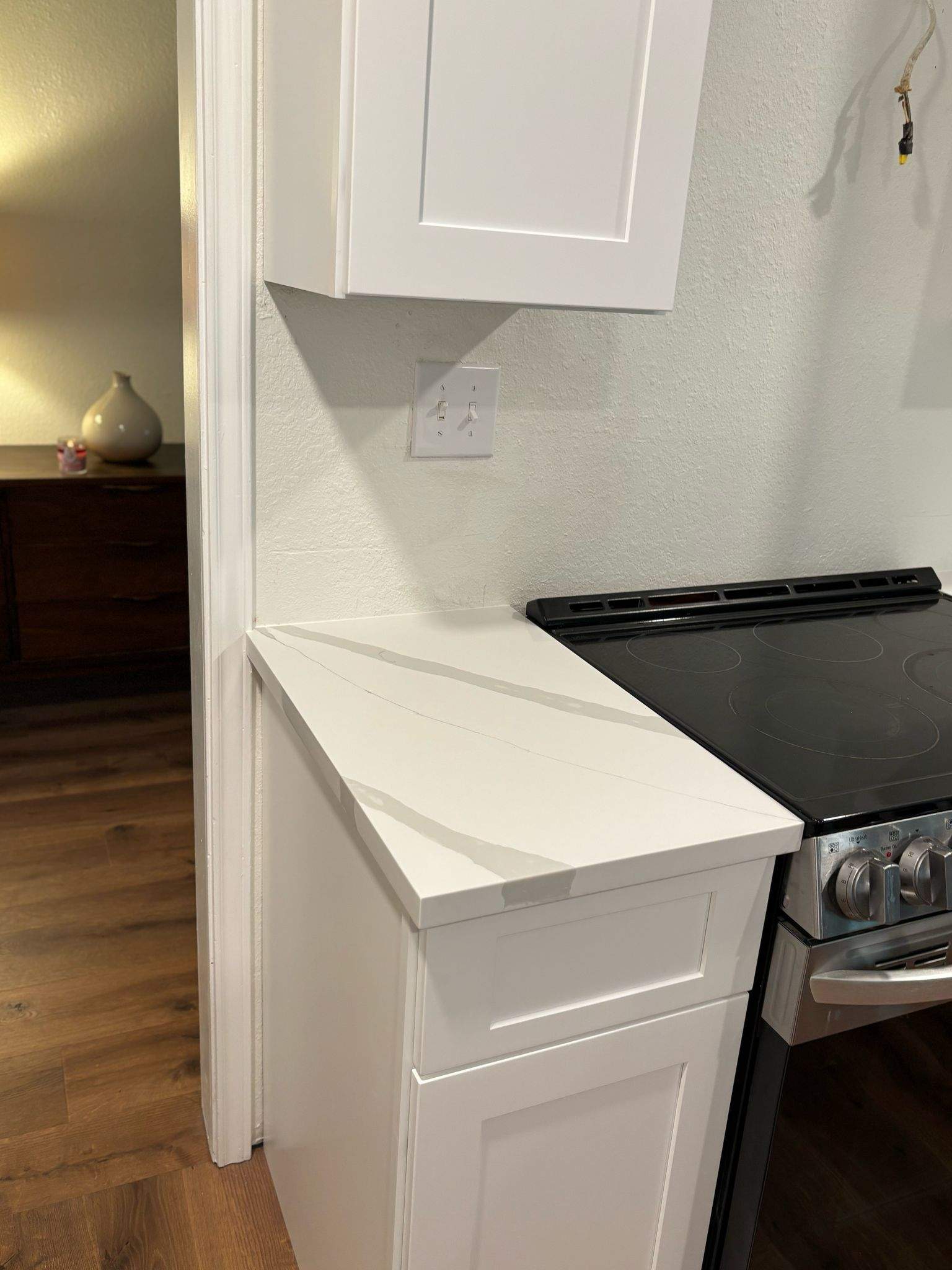 Modern Kitchen Renovation with White Shaker Cabinets in San Antonio by Mena stone surfaces