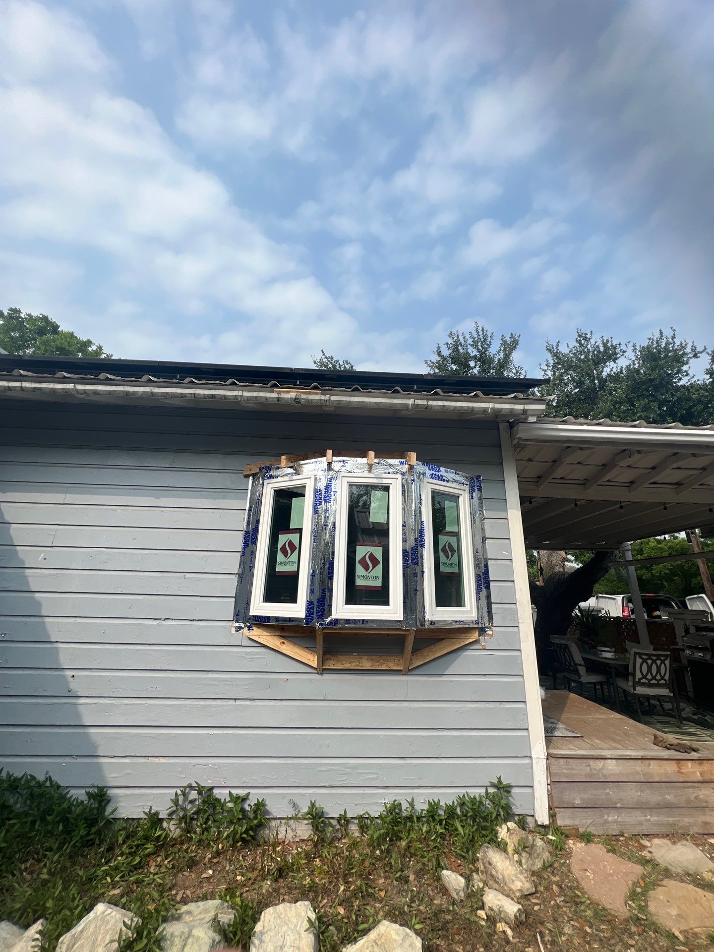 Installing Windows on a Submarine  by Bayfront Roofing and Construction
