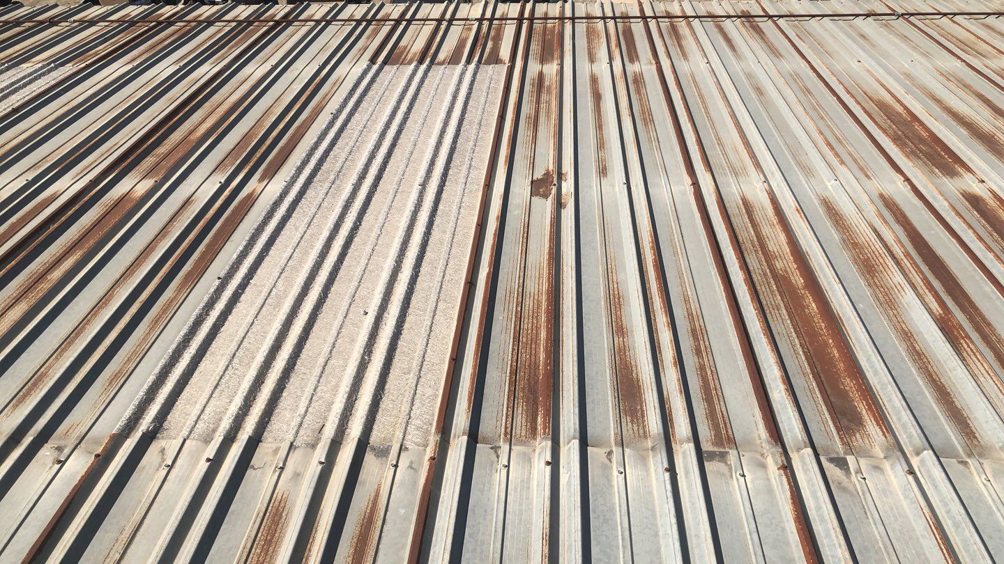 Metal Restoration Roofing system with Benchmark/PUMA XL 20 yr warranty by Straight Edge Roofing Inc