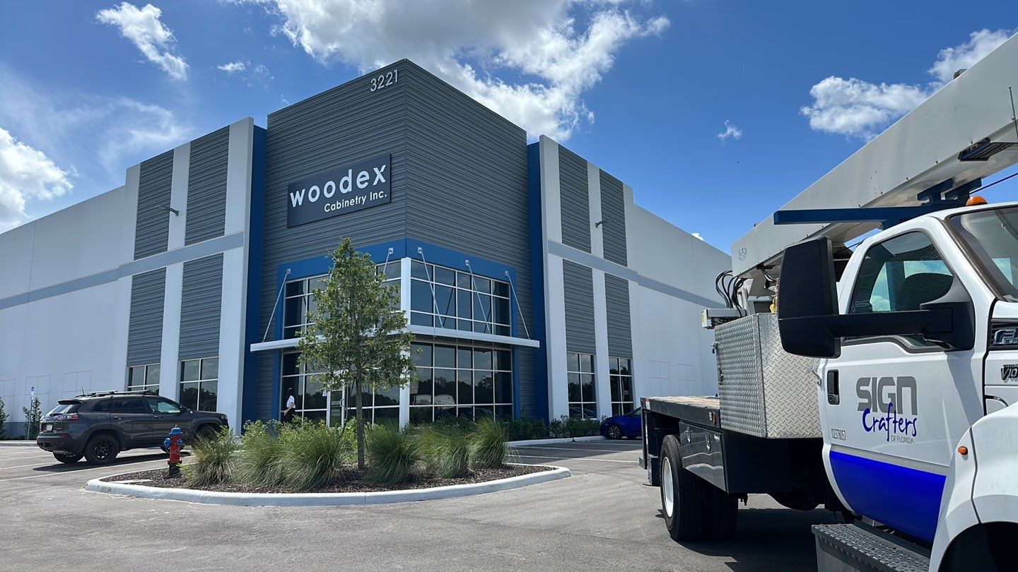 Acrylic Letters on Aluminum Backer for Woodex Cabinetry by SignCrafters