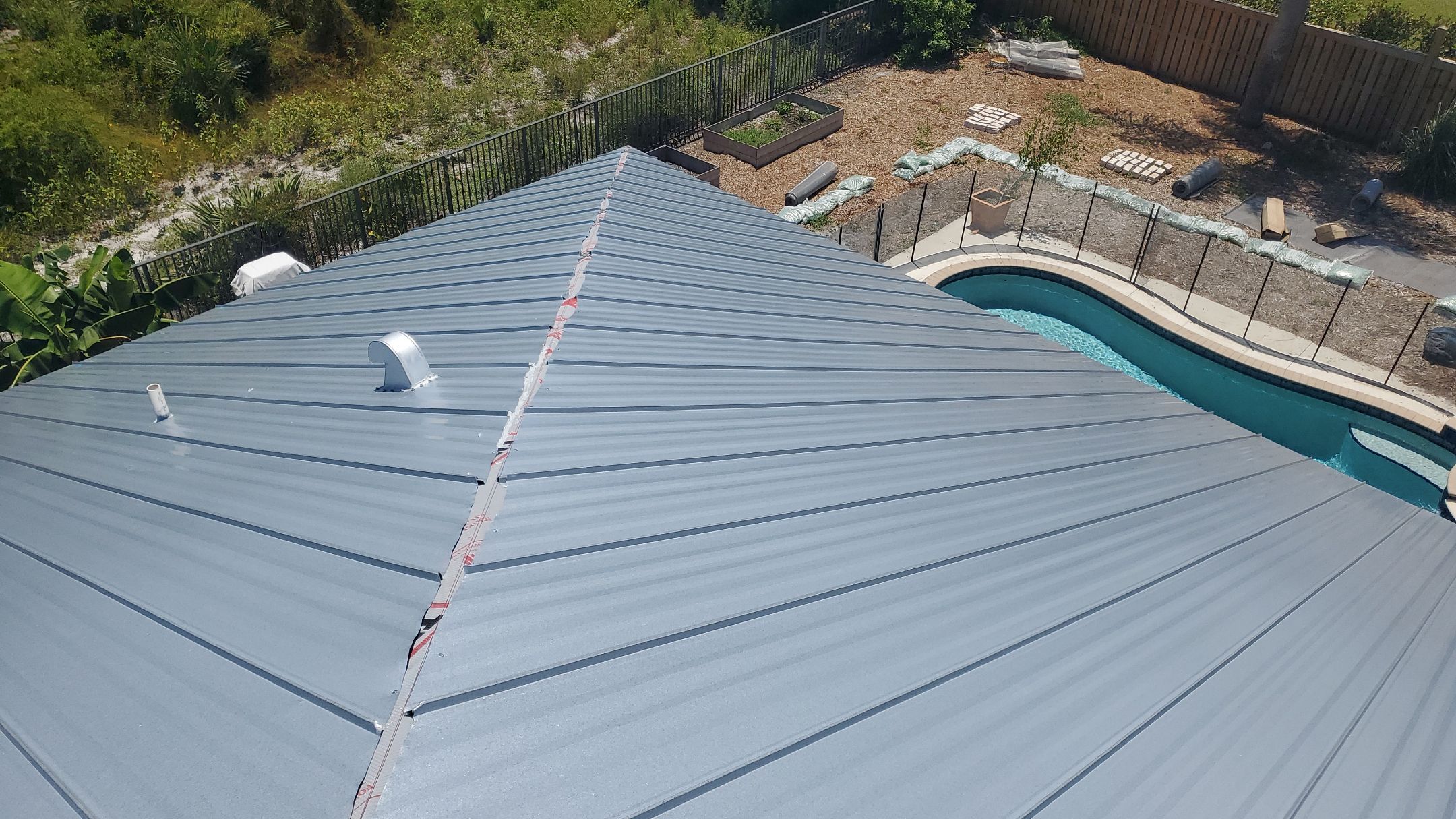 Standing Seam Metal Roof Replacement by Sailfish Roofing