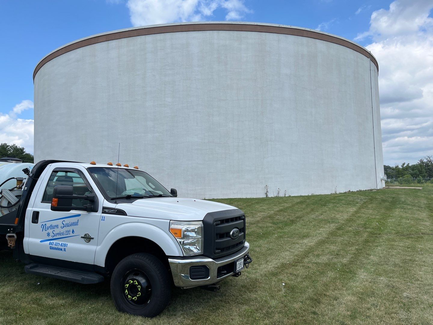 Water tank cleaning by Northern Power Washing LLC.