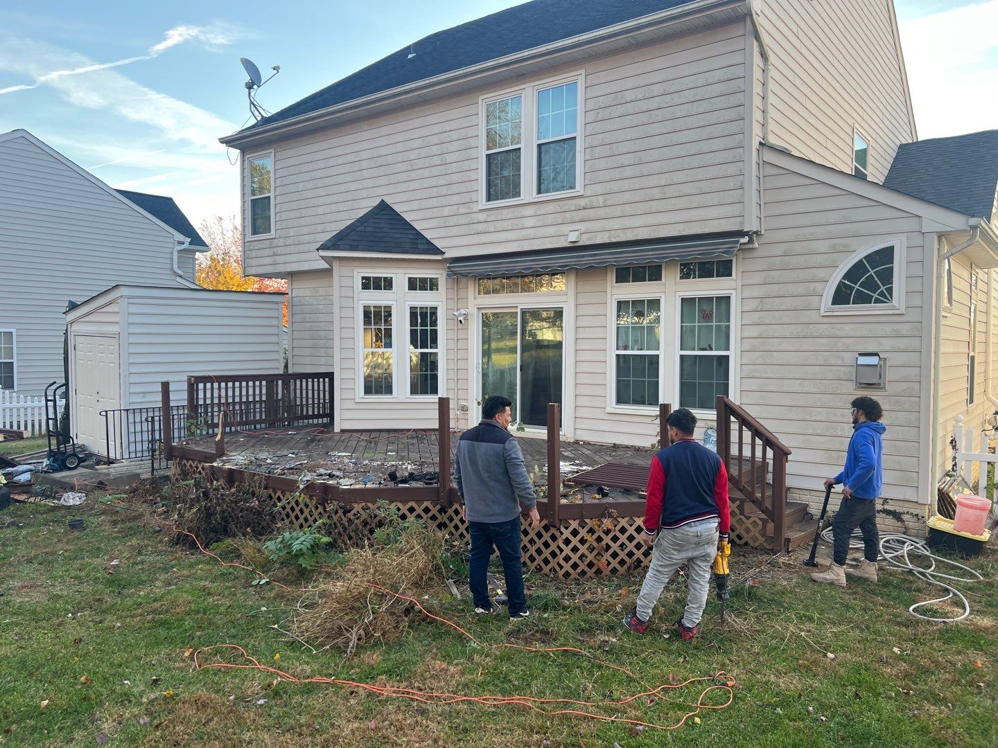 Custom Screened-In Porch with Stamped Concrete Patio in Warrenton by Jakari Restoration & Construction LLC