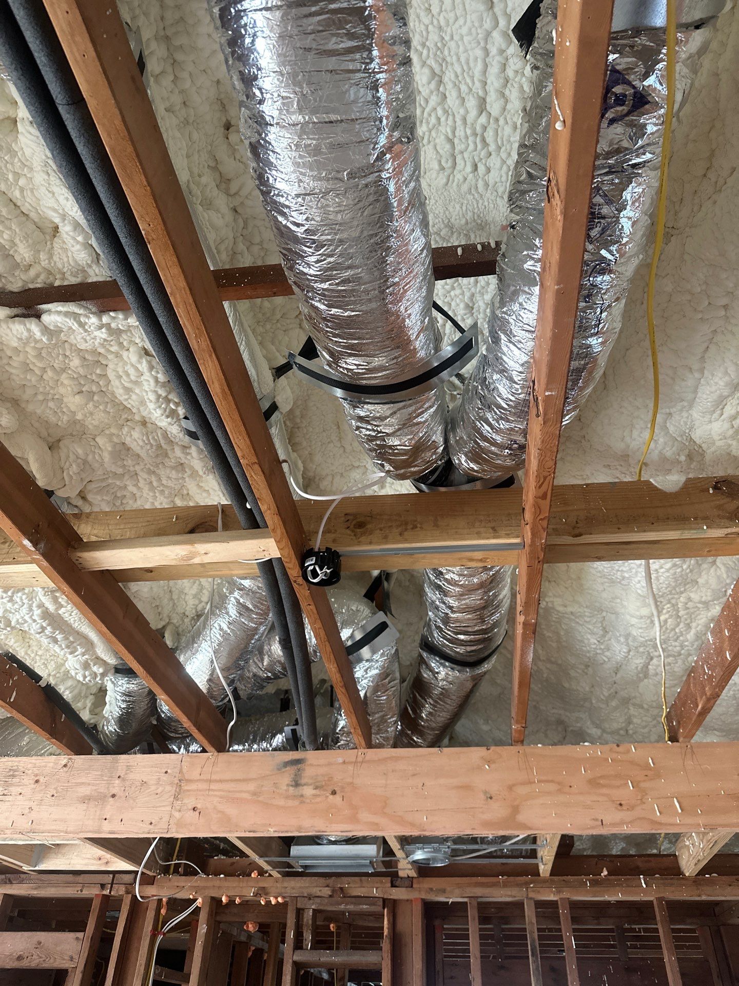 Open cell spray foam & rockwool job completed in Dallas TX by Apex Insulation Solutions