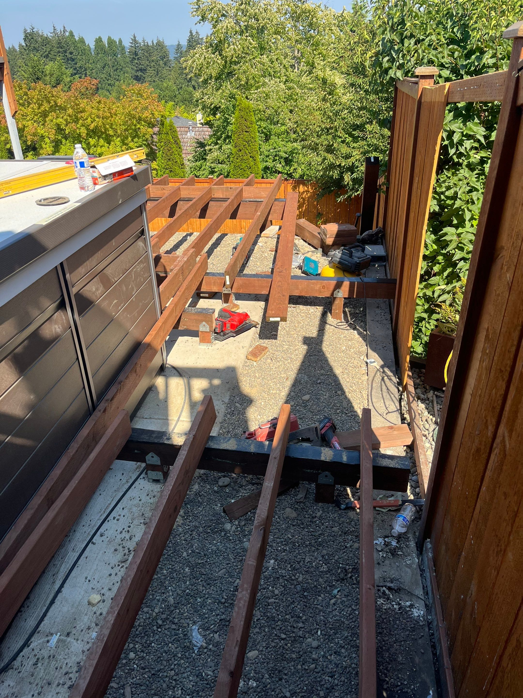 Tacoma Custom Composite Deck and Hot Tub Surround with Retaining Wall by Emerald City Energy 