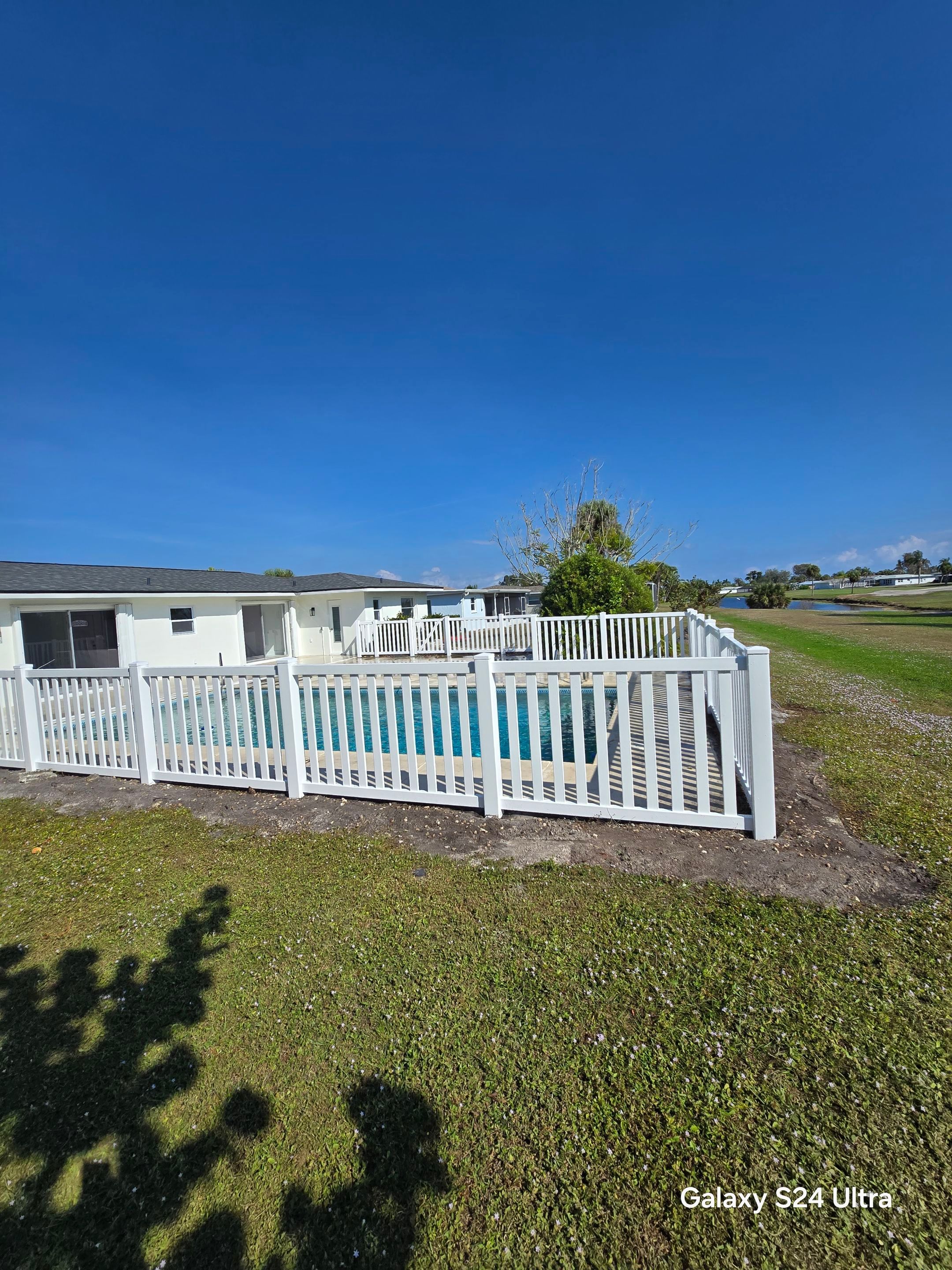 Vinyl Picket Fence for Pool in Port Charlotte by True Fence LLC