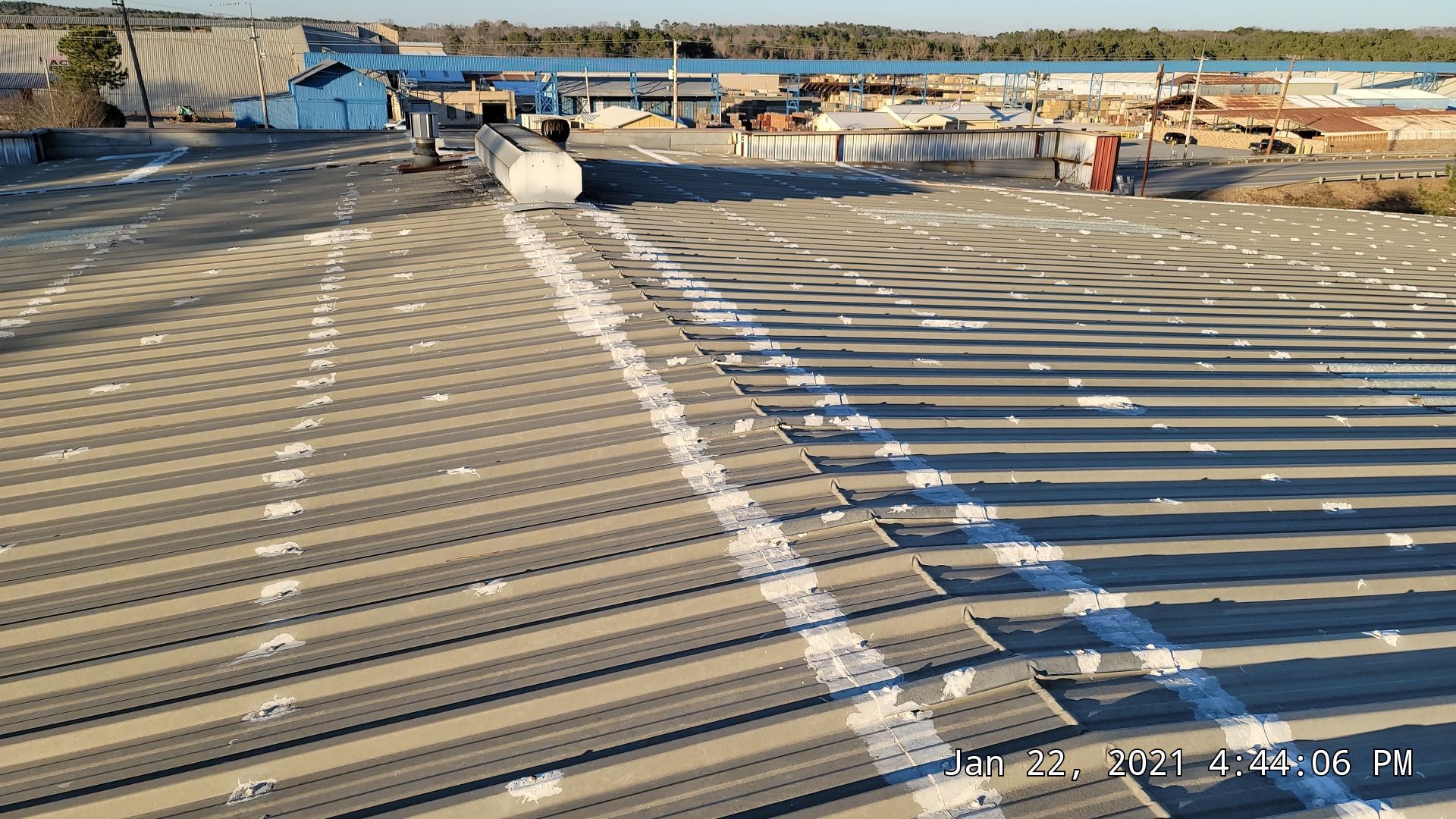 Commercial Roofing Installation using Aldocoat Coatings by Hostetler Roofing