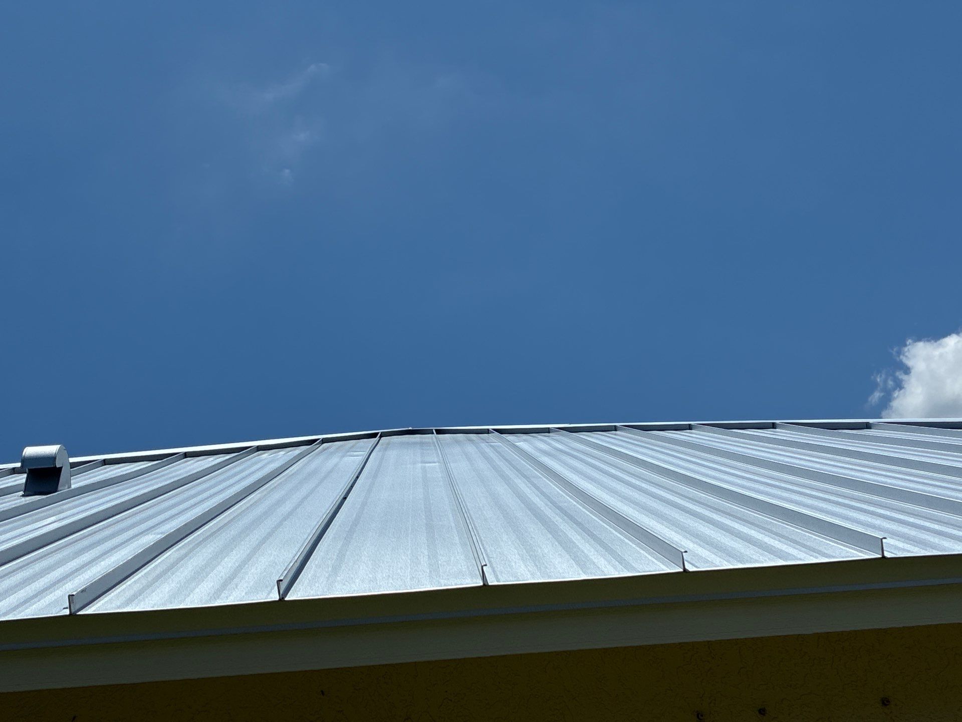 24ga 1.5" Mechanical Seam Mill Finish by Total Roofing System The Metal Roof Experts