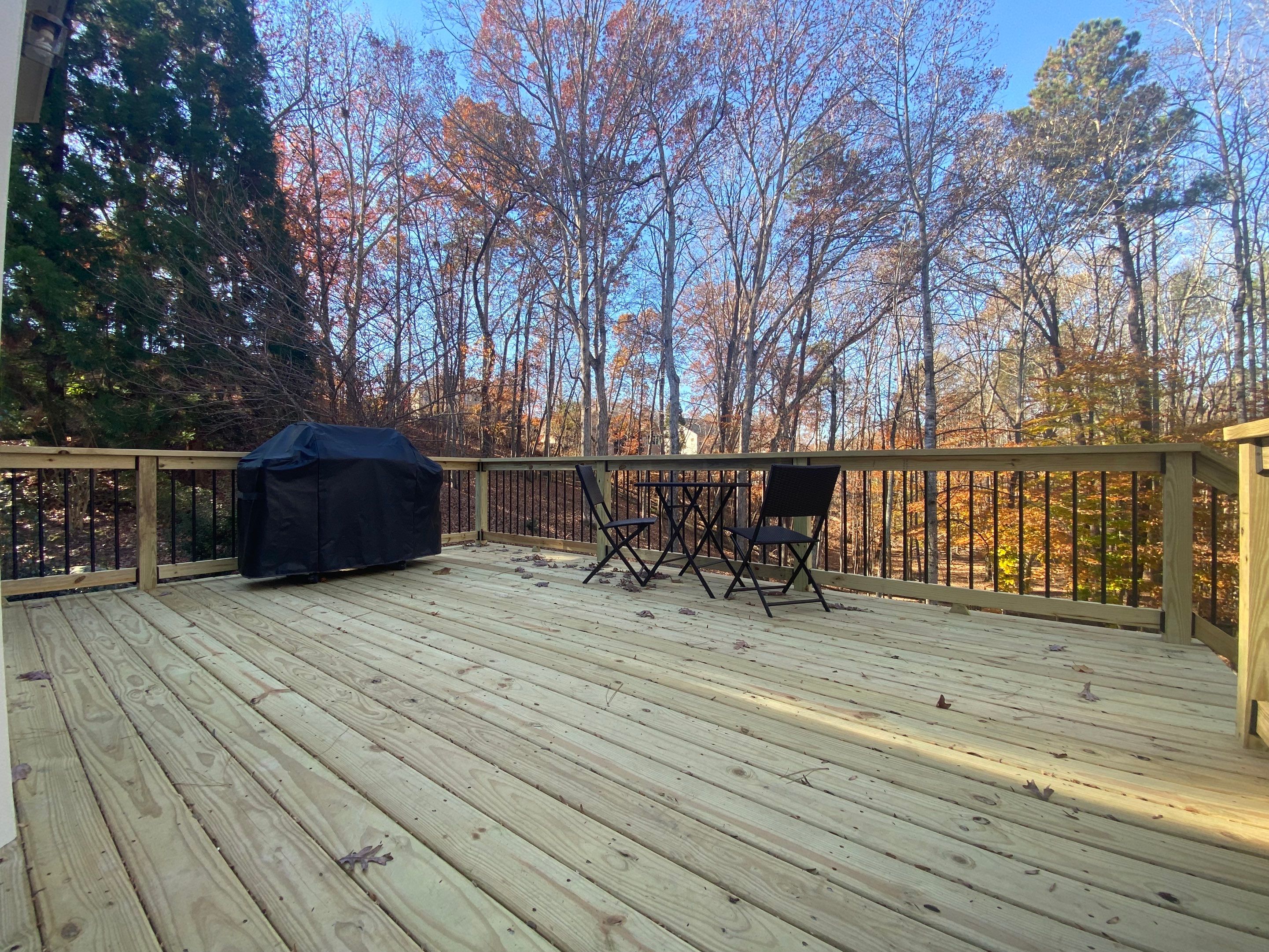 Elevated Wooden Deck and Staircase Construction in Cumming by Swift Home Renovations