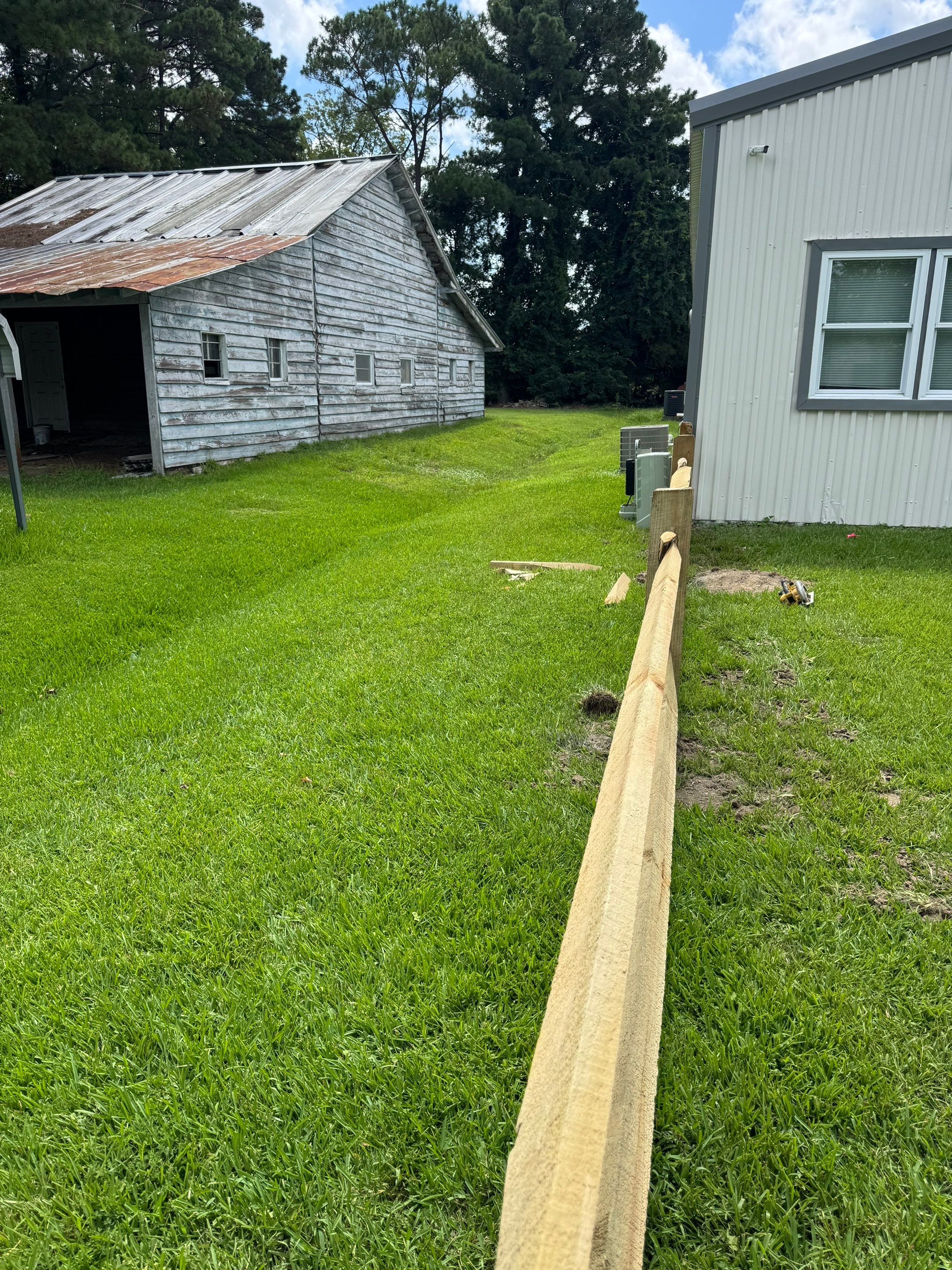 The Fence That Welcomes You Home by Tidewater Trim & Deck