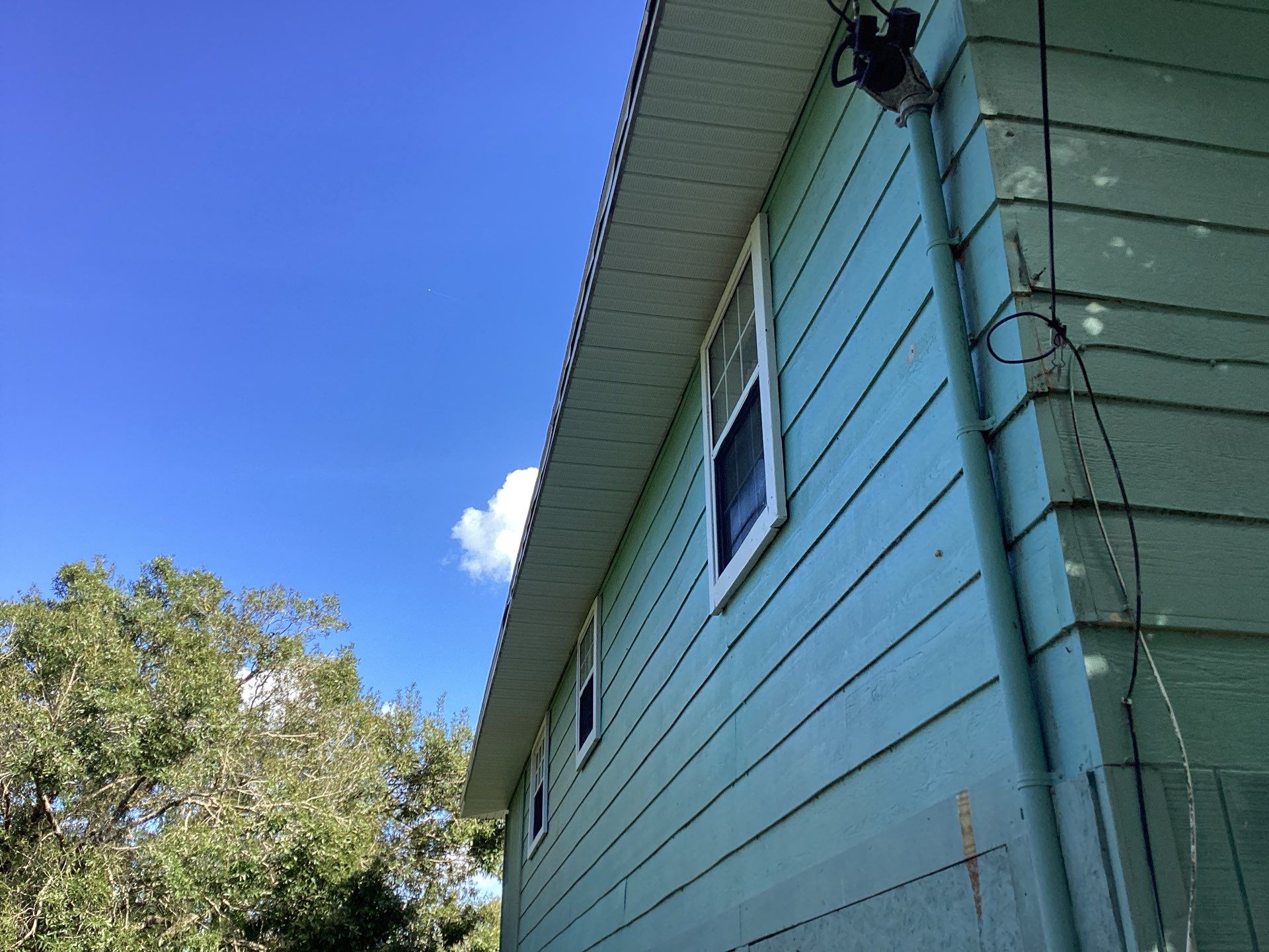 Soffit and Fascia Installation using White Soffit in Lehigh Acres, FL by Gutter Professors