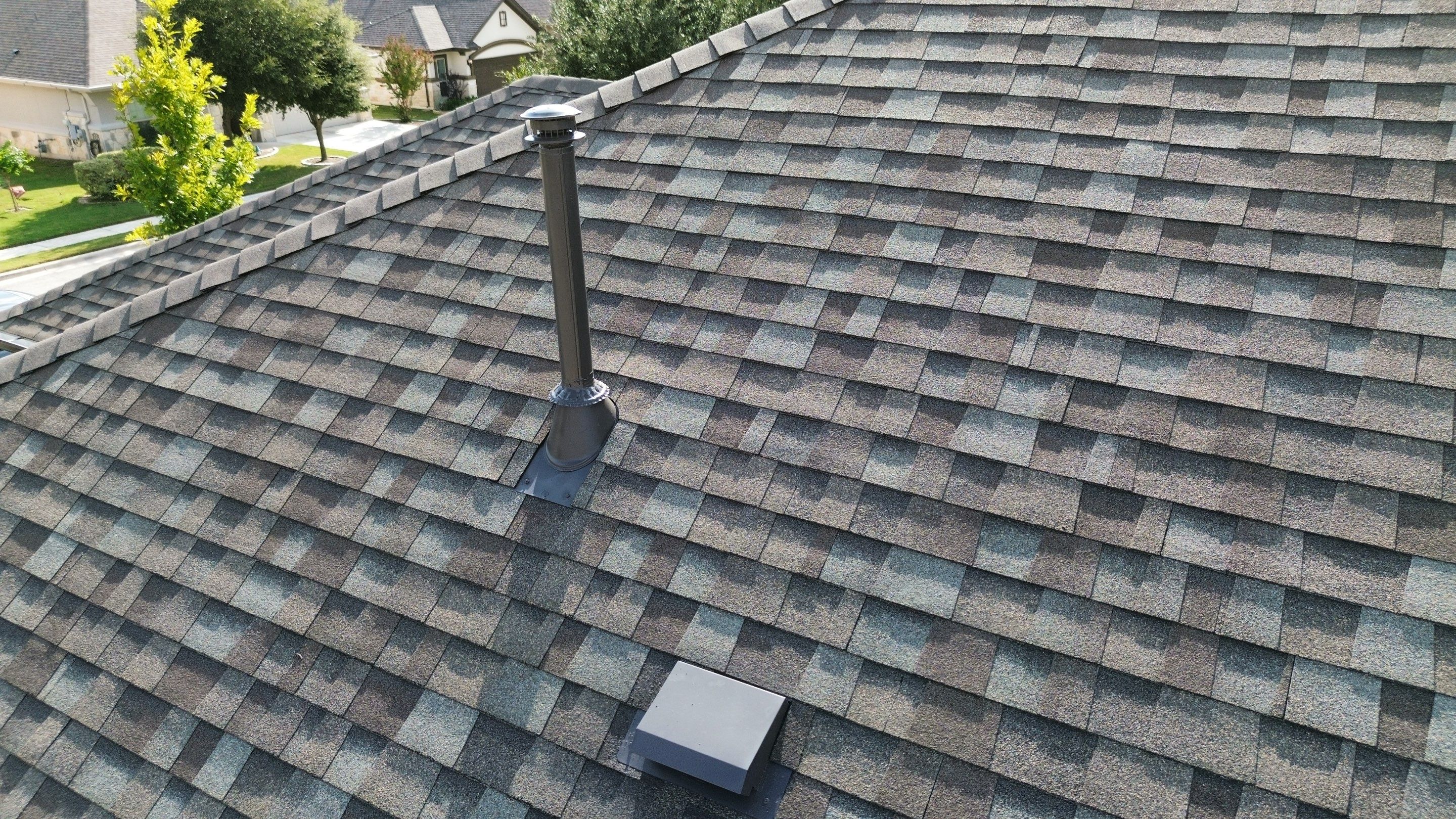 Full Roof Replacement with Solar Reinstall – Duration Driftwood | Round Rock, TX by Kstylez Roofing & Construction