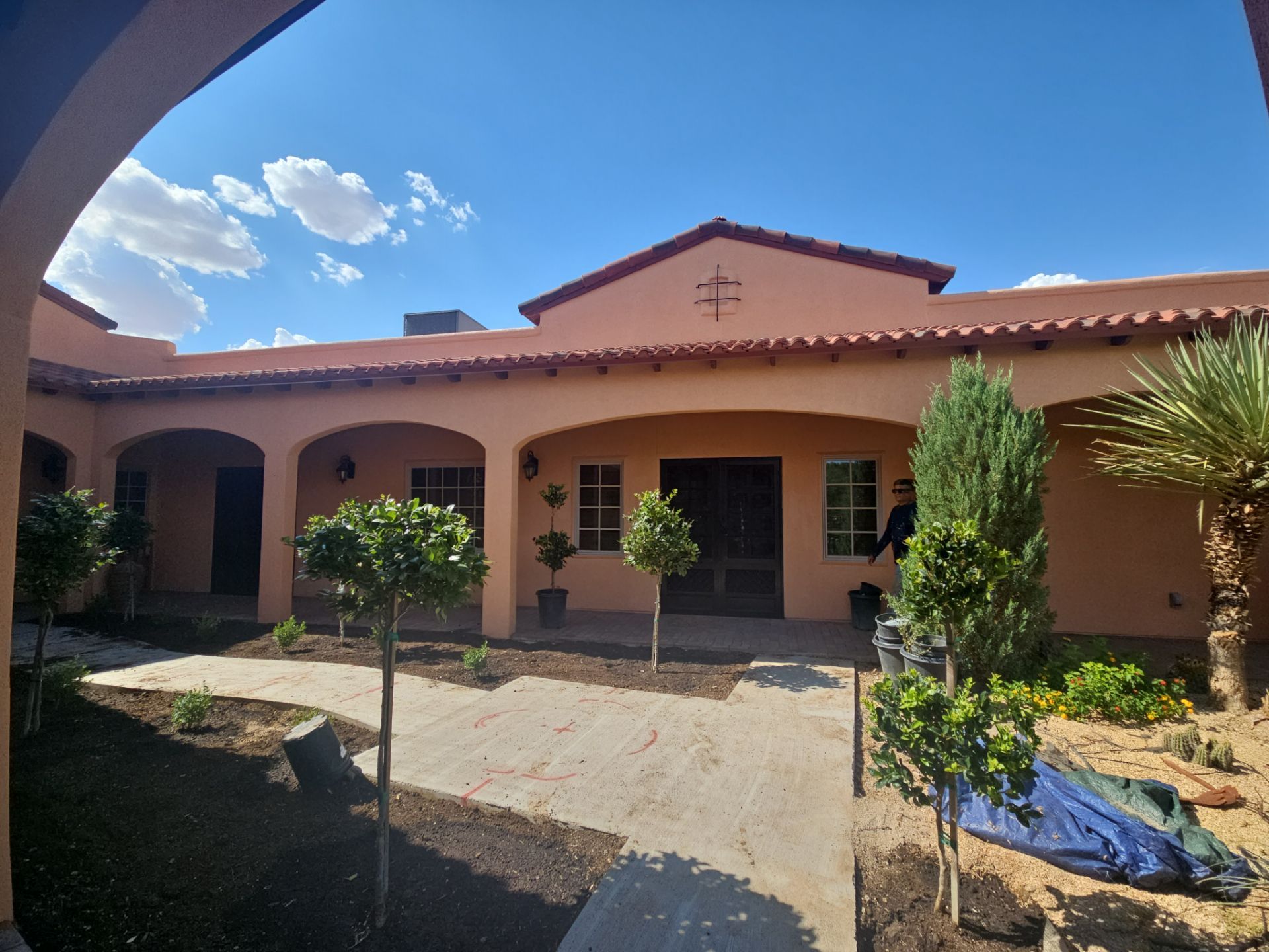 Exterior Painting with Stucco Damage by Regal Renovate