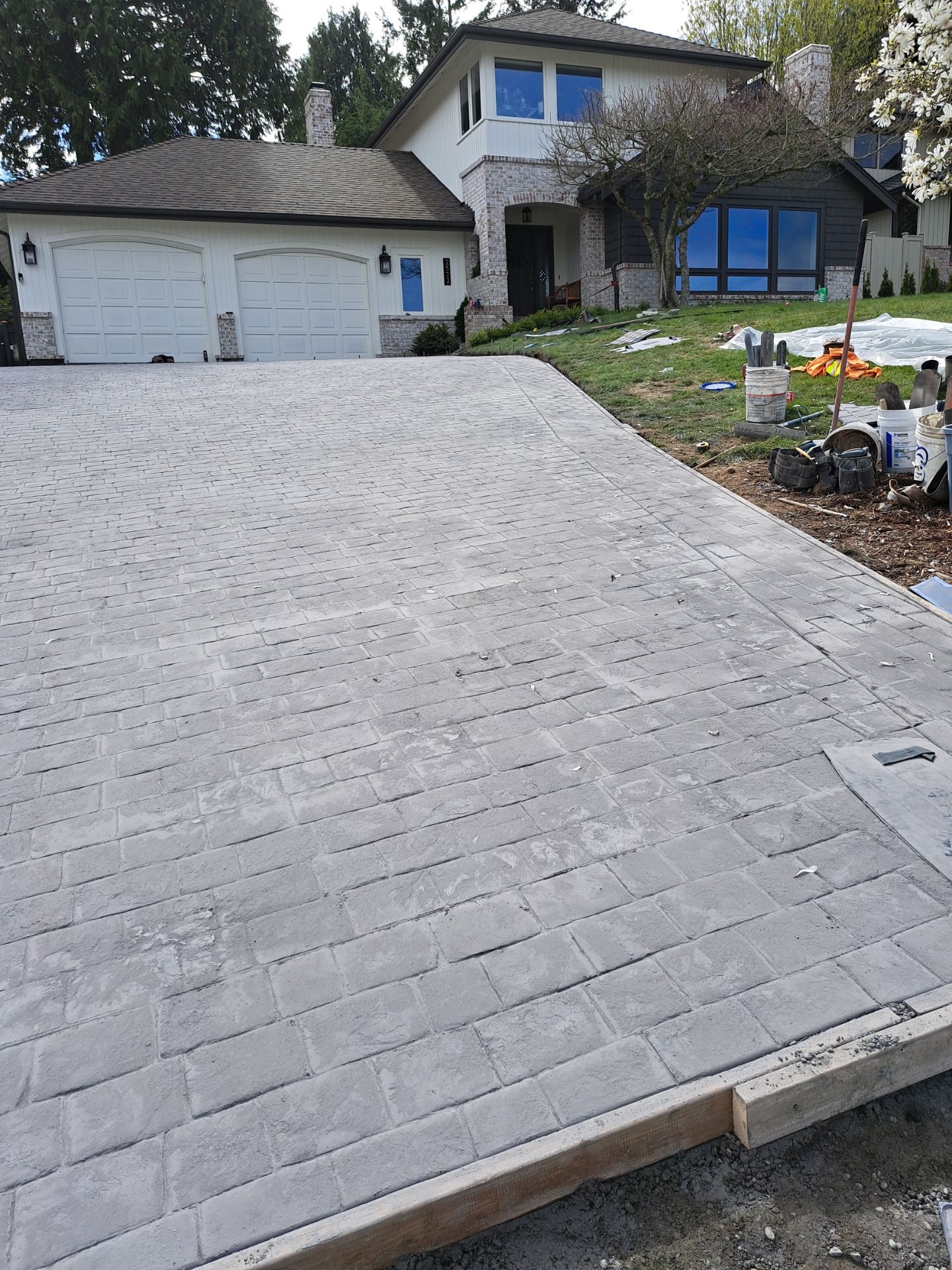 John | Stamped Concrete Driveway Makeover by Jireh Asphalt & Concrete Inc 