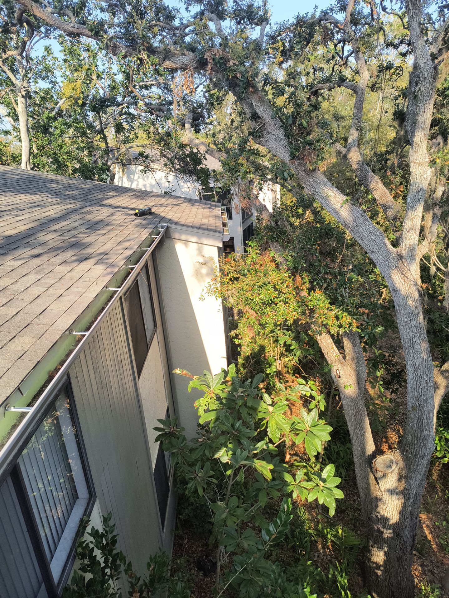Professional Gutter cleaning Aluminum Seamless Gutters  in Sarasota FL by Gutter Professors