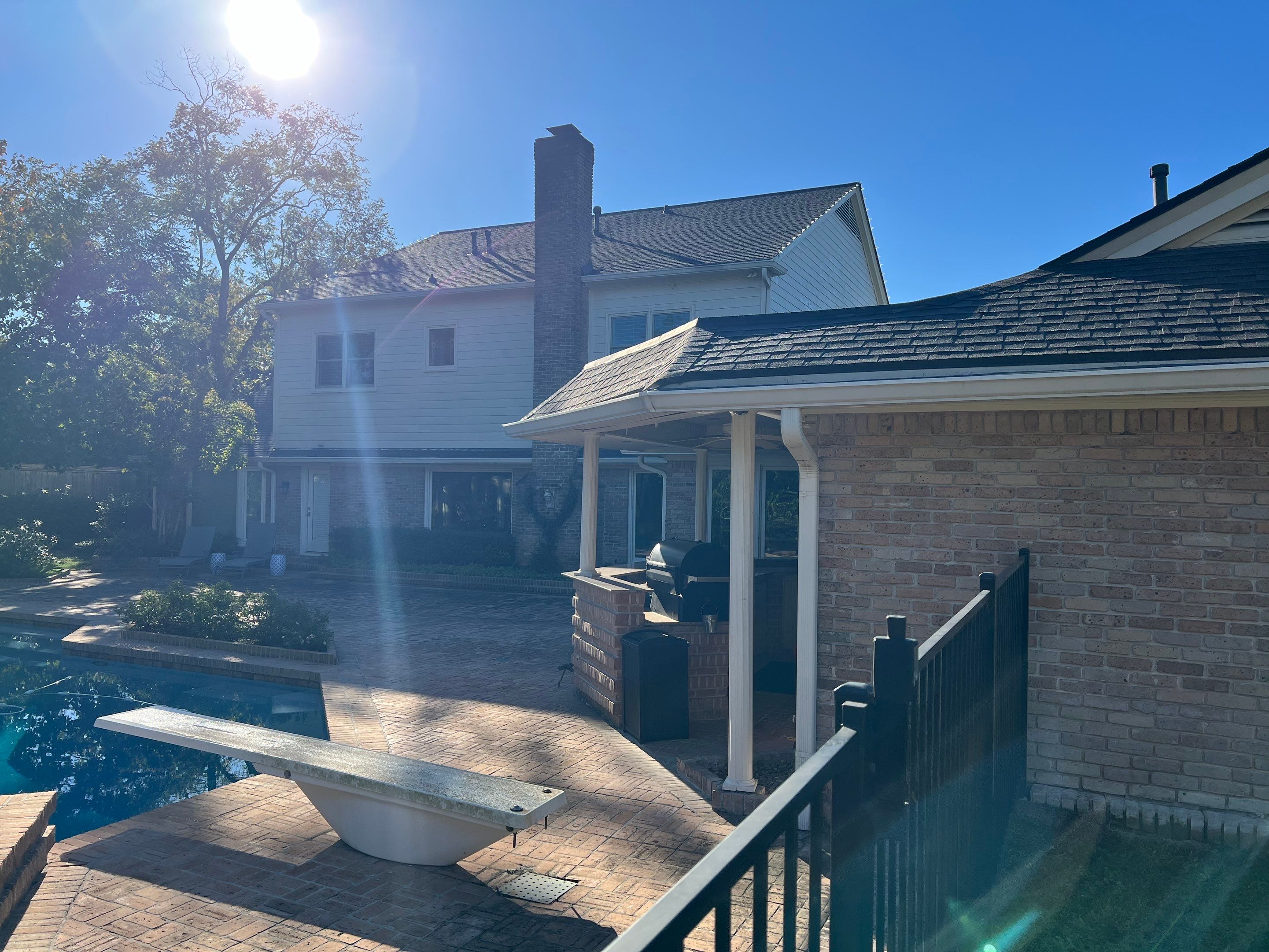 Siding Replacement Memorial Home by Kainos Roofing & Exteriors
