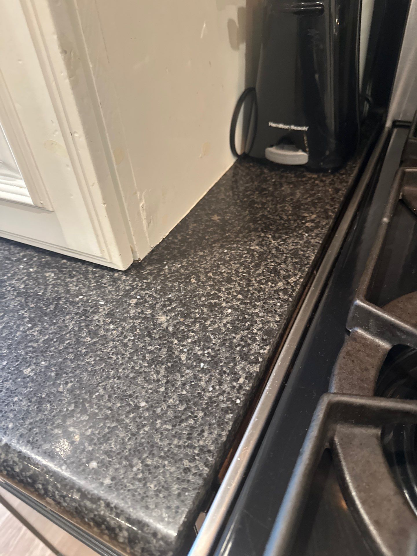 Kitchen countertops using Mysterio Gold Vicostone by Mena stone surfaces