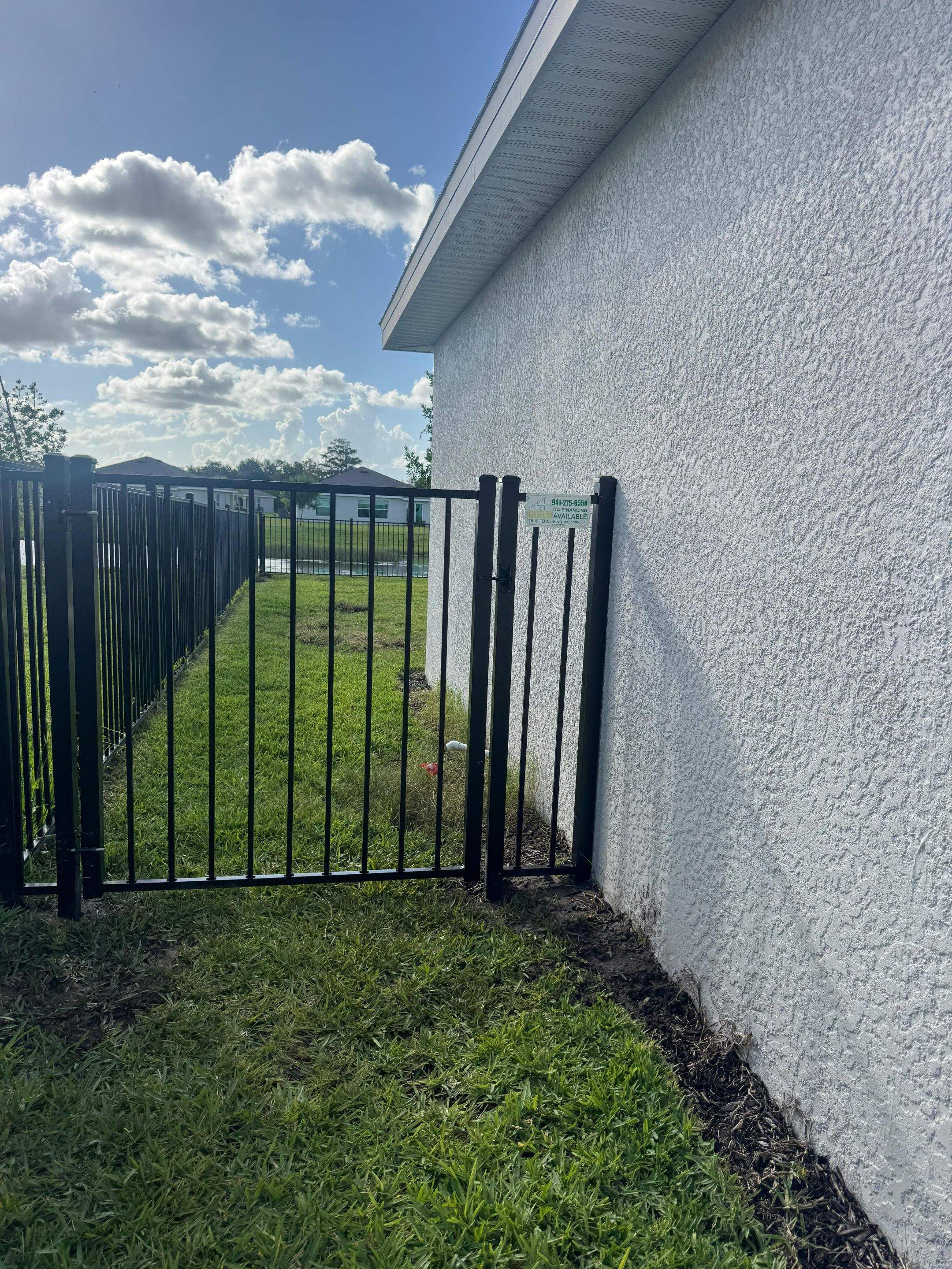 Black Aluminum Picket Fence Installation in Lehigh Acres by True Fence LLC